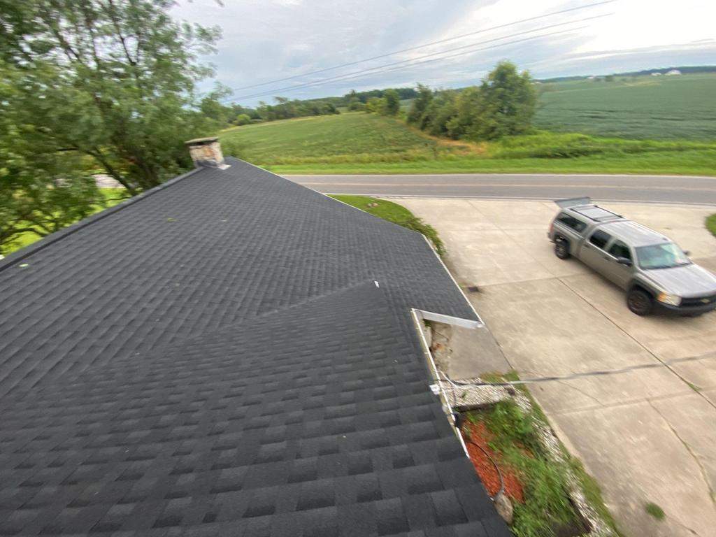 Storm damage roof replacement by Nitro Roofing and Construction
