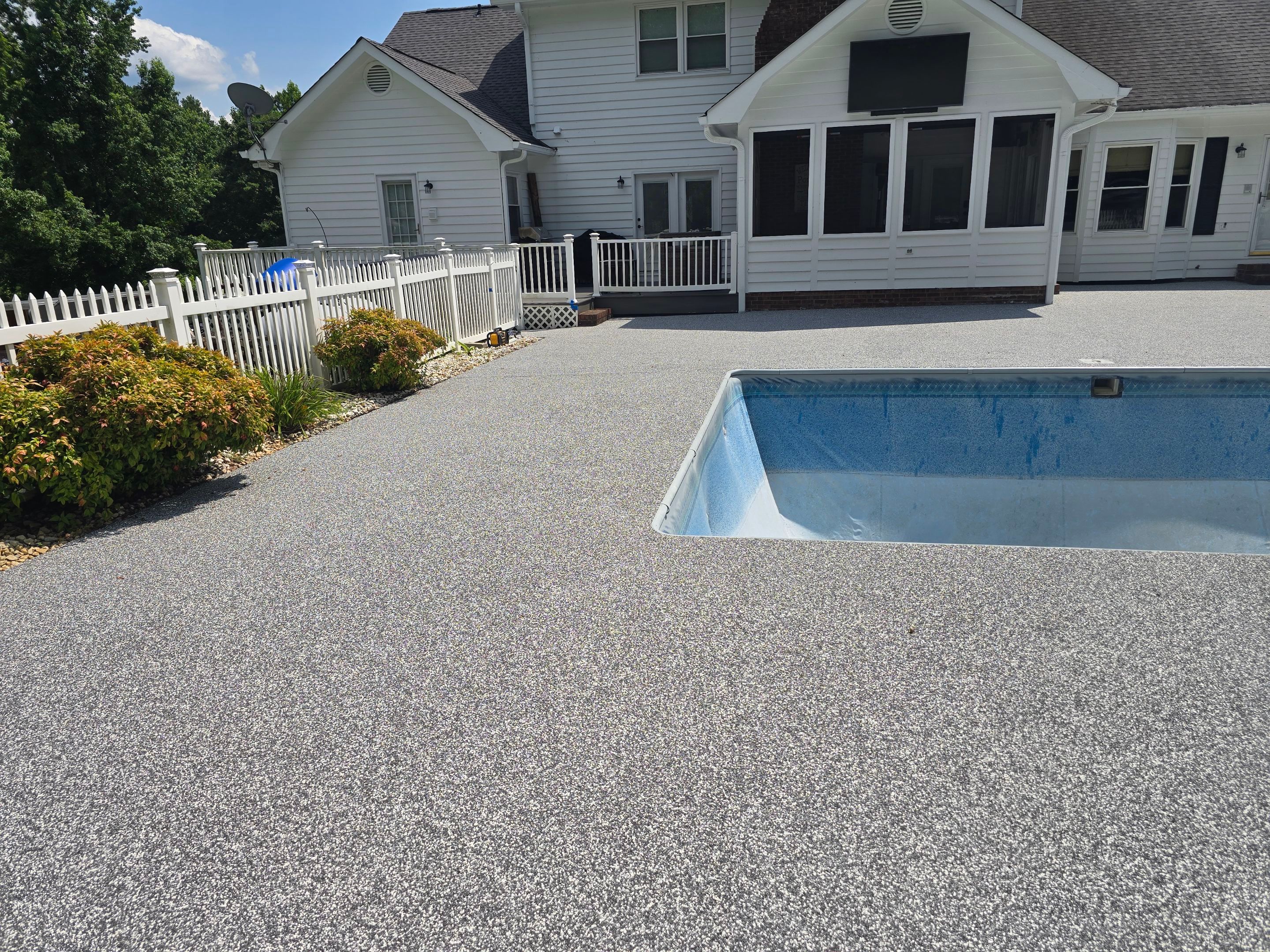 A Pool Deck Surface to Last for Years of Pool Parties by Elite Floor Solutions