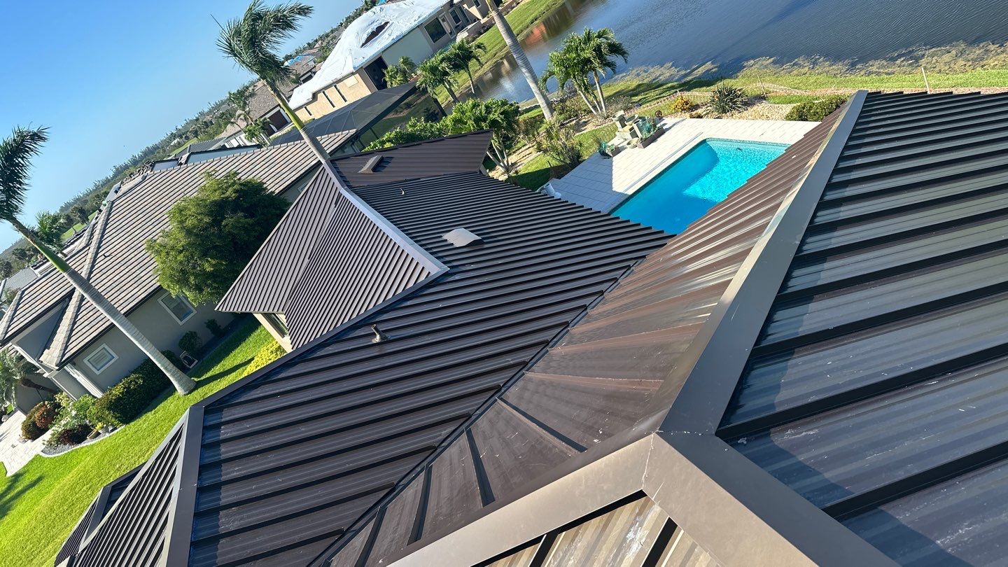 Residential Roofing Installation using Standing Seam Metal Roof in Cape Coral, FL by International Roofing