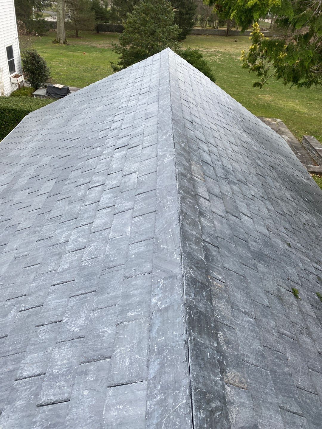Residential Roofing Installation using Vermont Slate by A Plus Exterior
