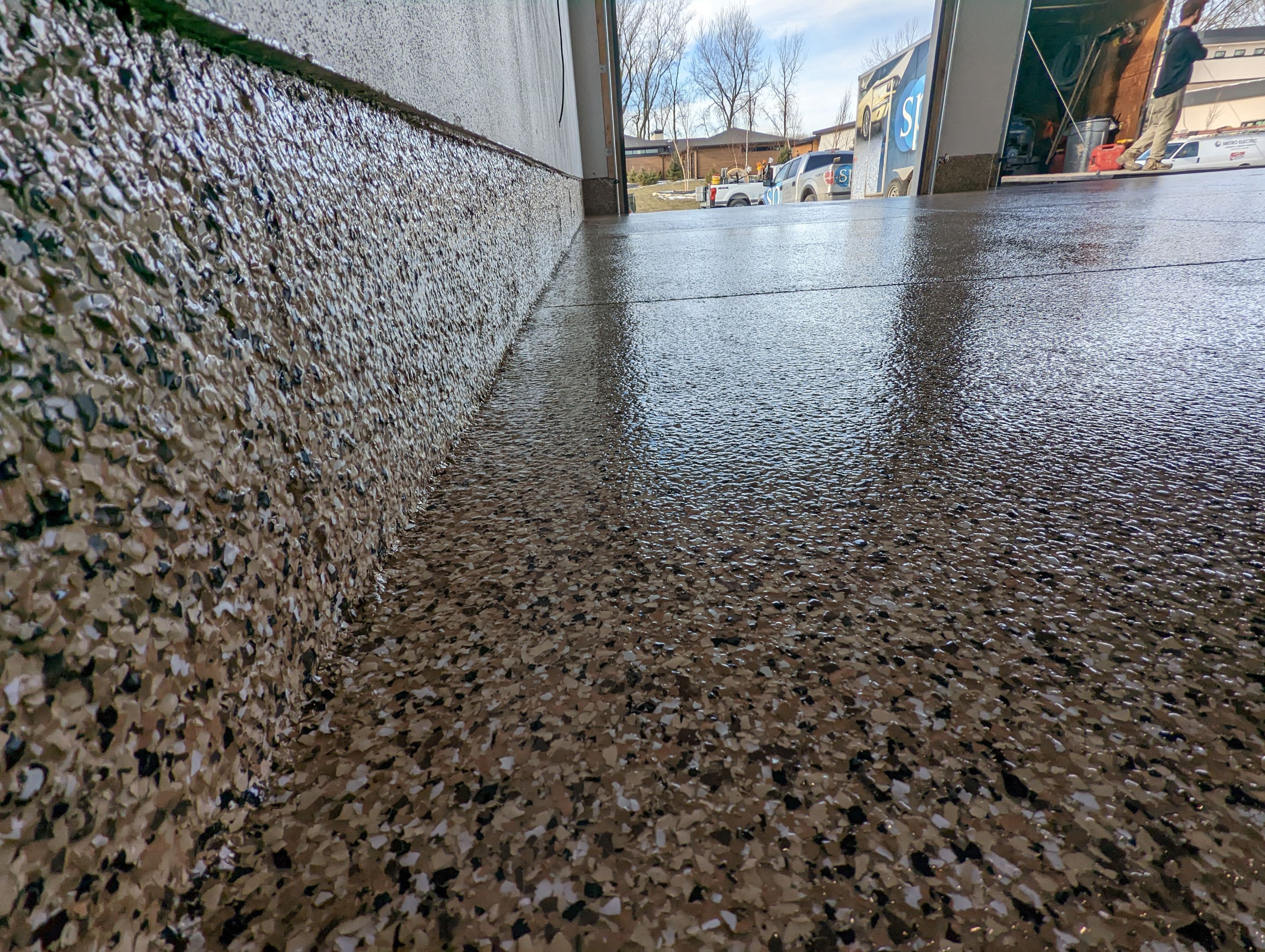 Garage using Sandstone by Select Painting, Coatings & Garage Cabinets