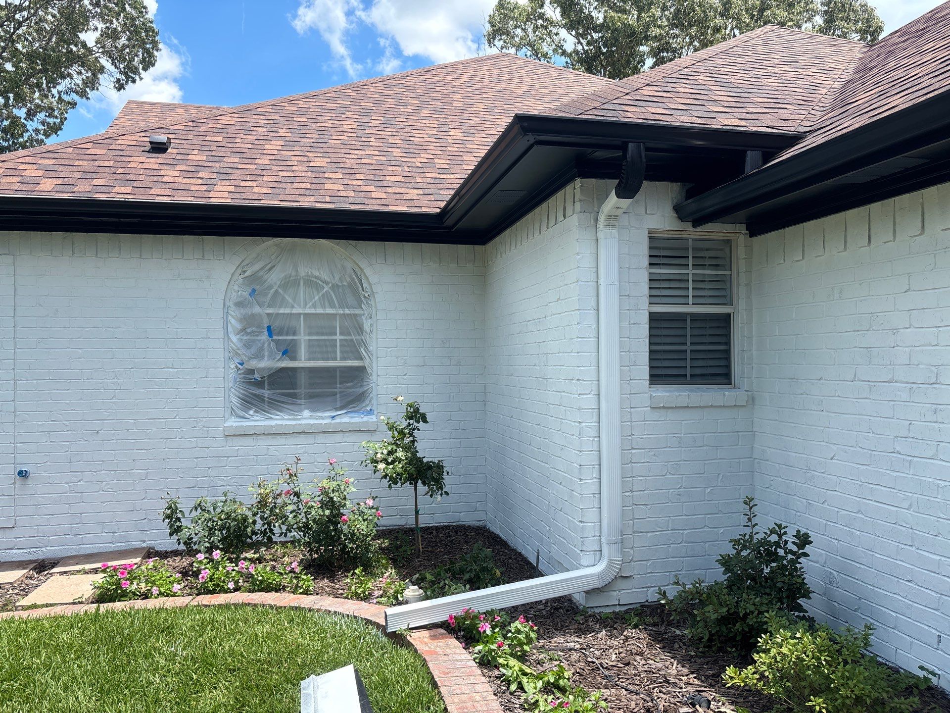 Project in TylerExterior Painting in Tyler, TX | White Brick Home, Varnished Fence & Shed Painting by Quality Coats Painting