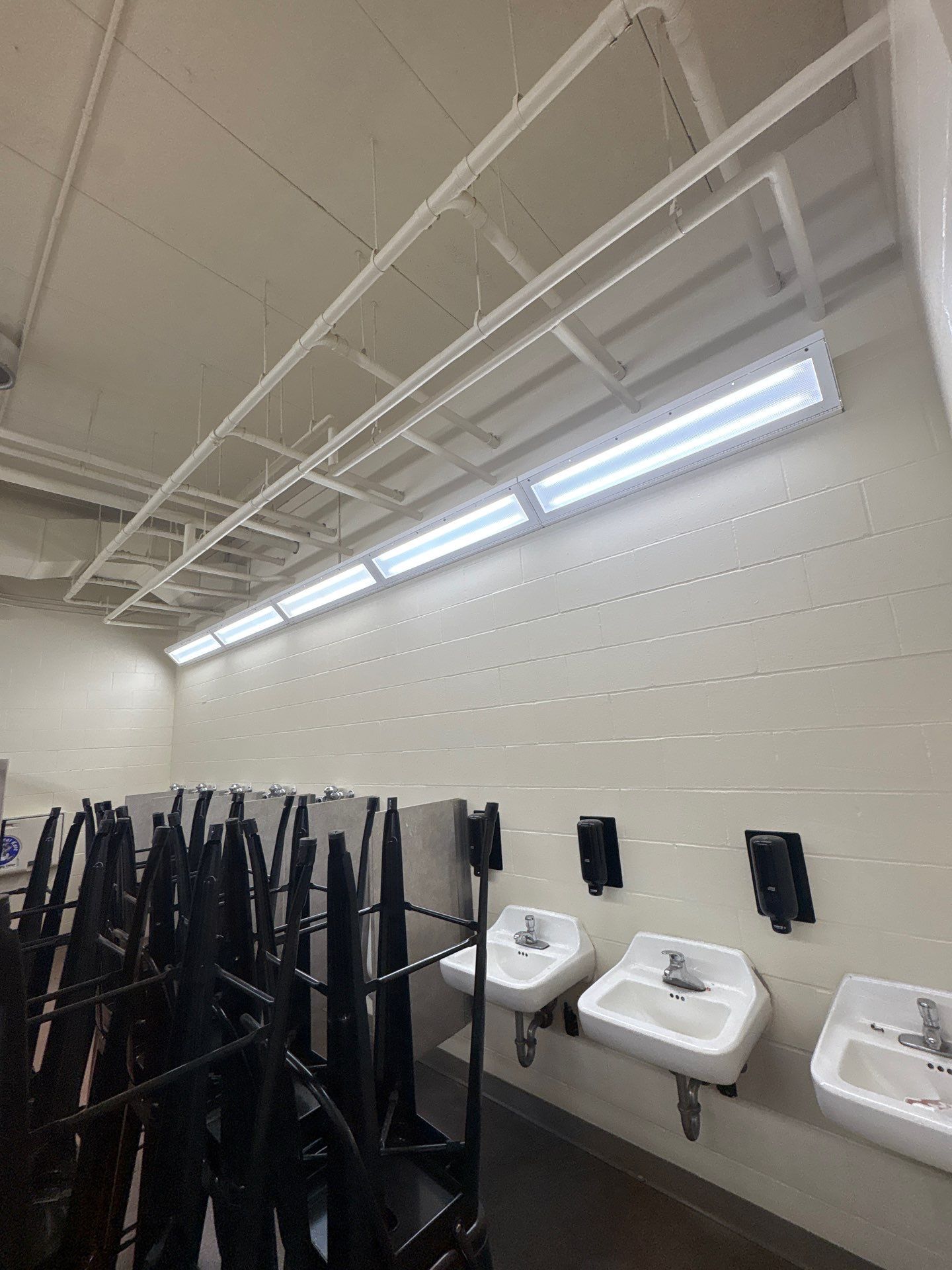 Commercial Restroom Interior Painting and Facility Updates in Sioux Falls by Select Painting, Coatings & Garage Cabinets