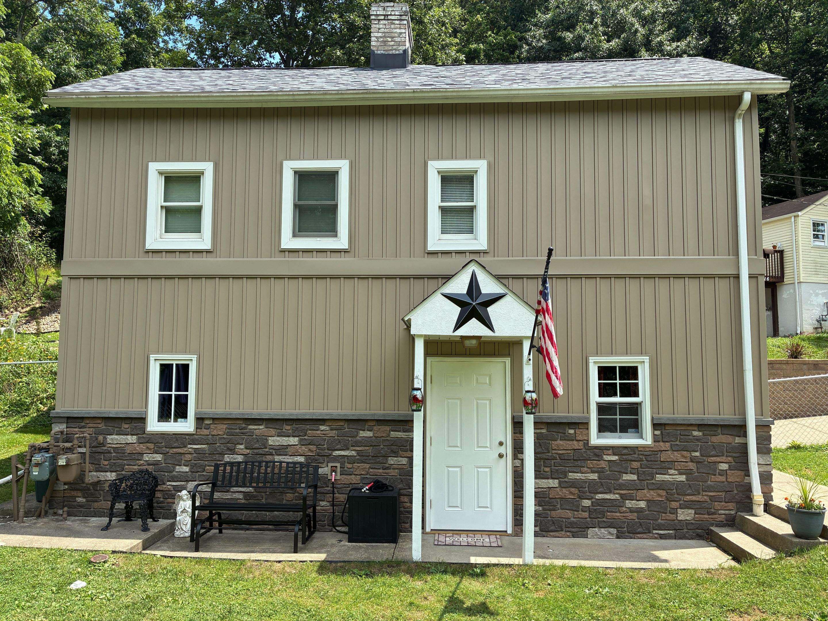 Jefferson Hills Vertical Board and Batten Siding and TandoStone Renovation by Ideal Siding Pittsburgh