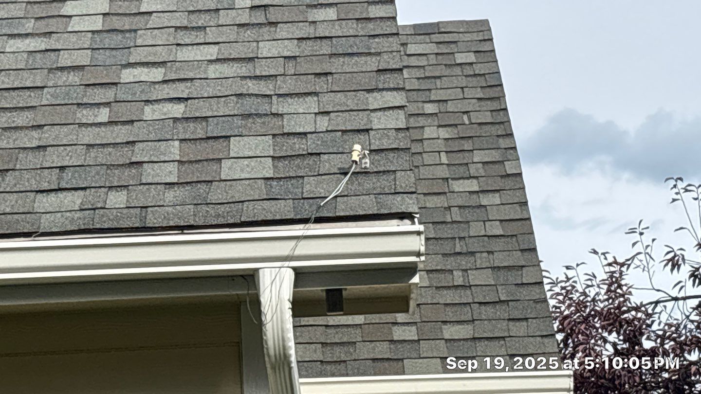 Storm Damaged Roof & Gutter Replacement by Eaton Roofing 