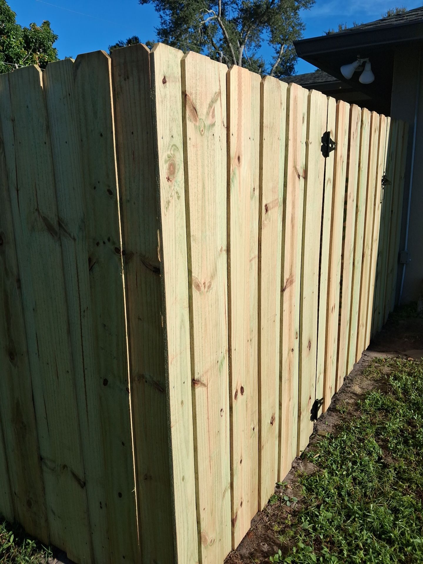 Pressure-Treated Wood Privacy Fence and Gate Installation in North Port by True Fence LLC