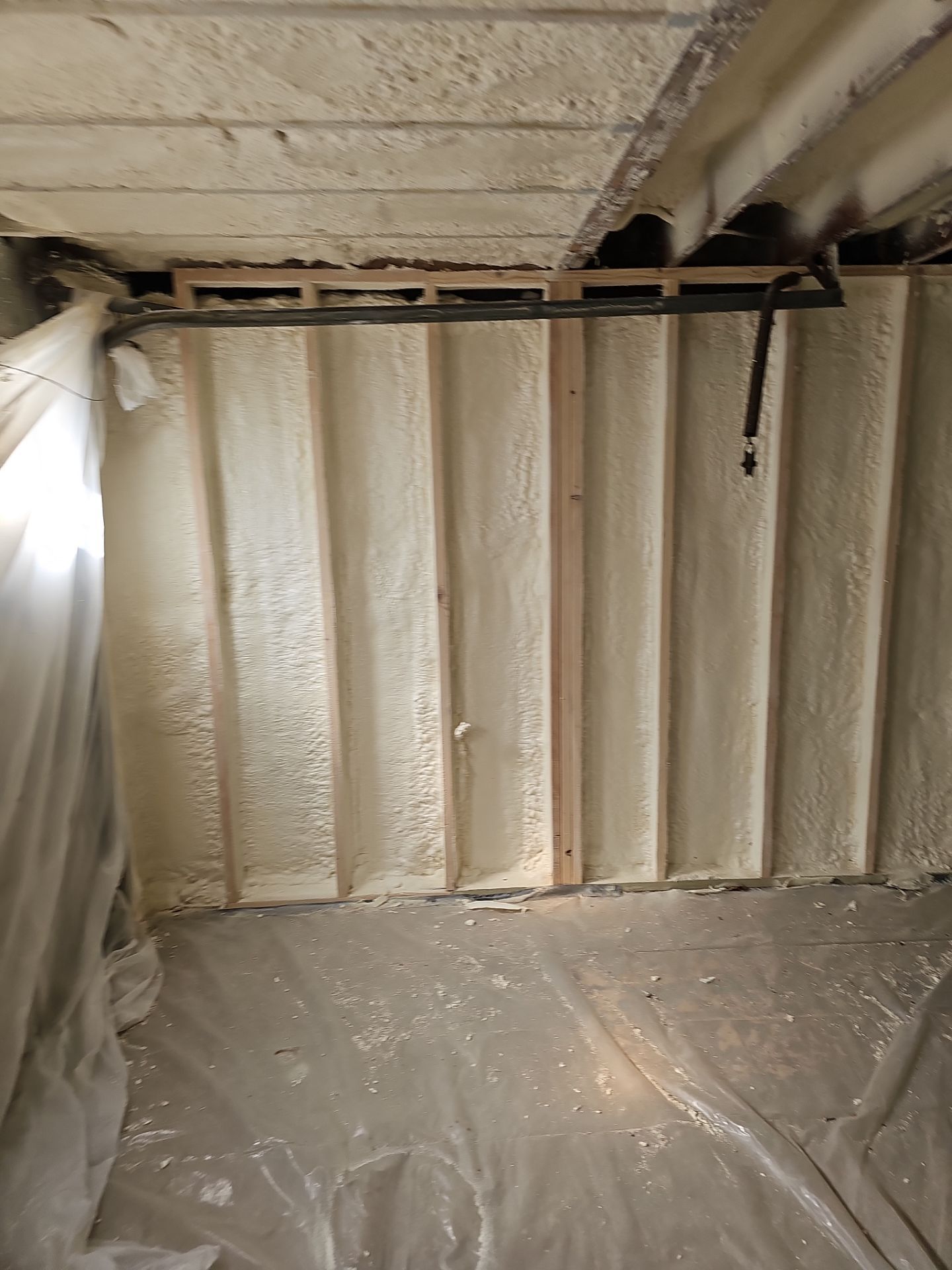 Basement Exterior Walls using Closed Cell Spray Foam by NYS Foam & Energy