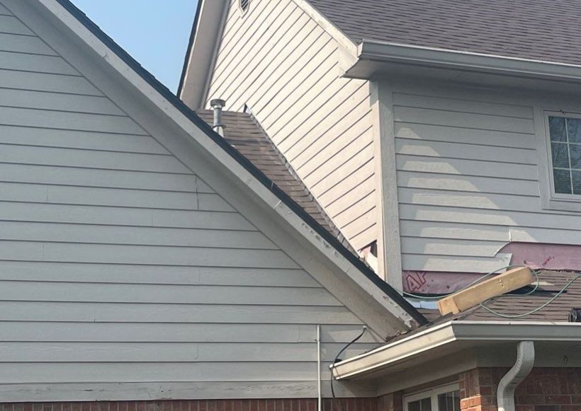 Tornado damage in Whiteland. Roof replacement, James Hardie siding, exterior paint, gutters, windows, doors by 317 Roofing & Restorations