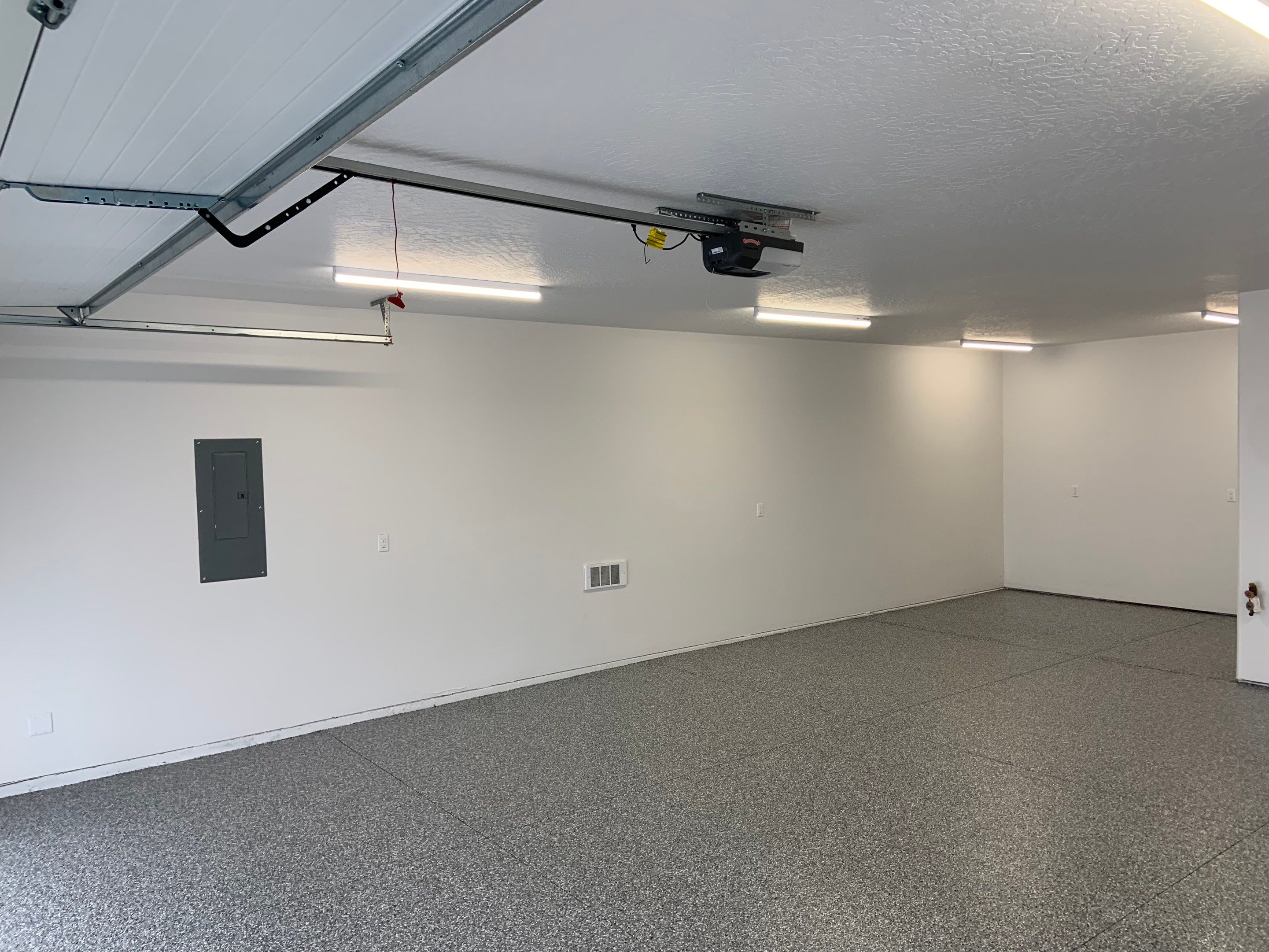 Garage Transformation using Smoke by Croc Coatings, LLC