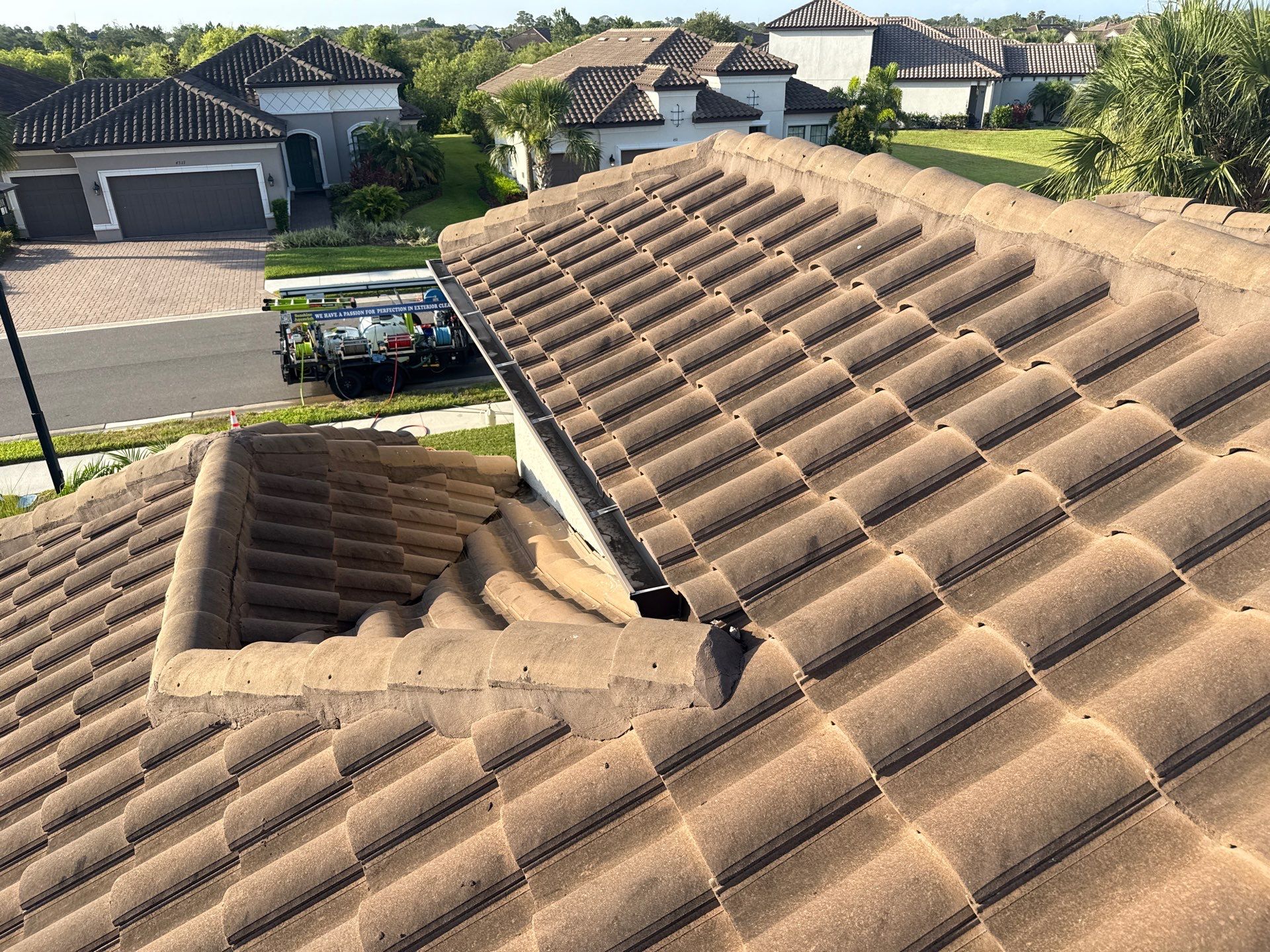 Soft Wash Roof Cleaning – Concrete Tile Roof | Artisan Lakes Esplanade, Palmetto, FL by Sunshine AquaWash
