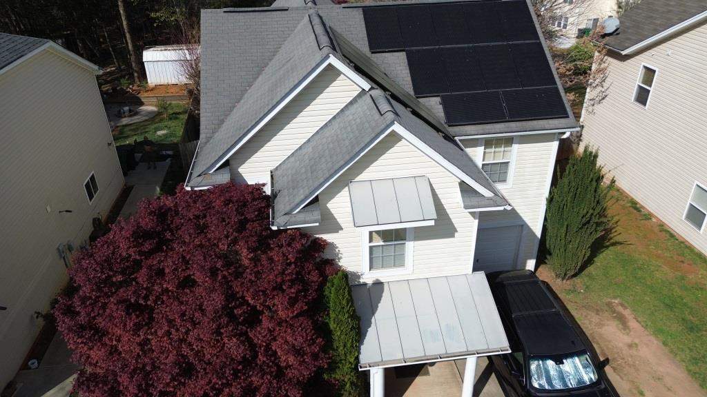 Roof and downspout replacement by hail and wind damage by Just Brilliant Restoration JBR
