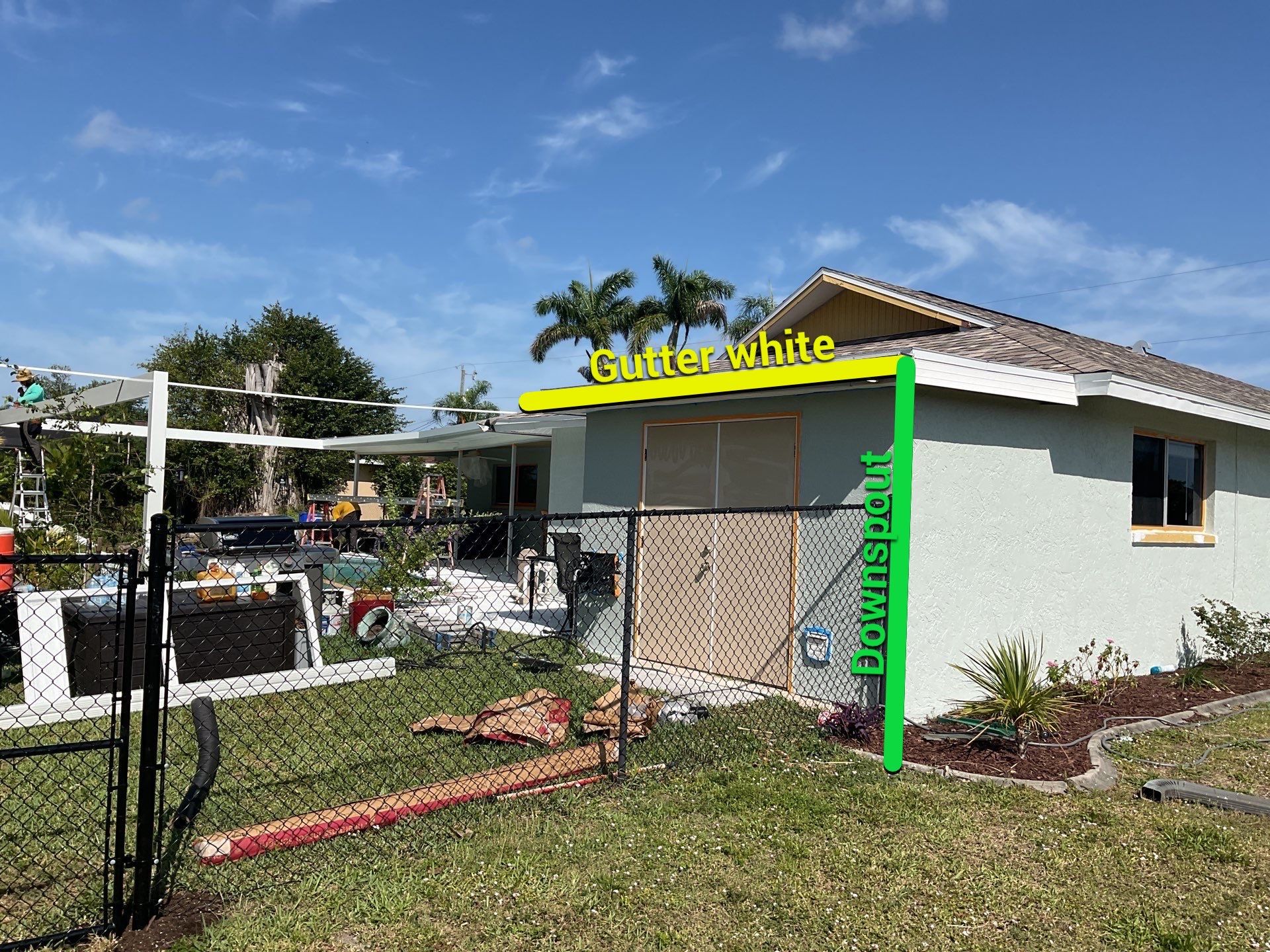 Downspout Installation using 3X4 Elbow Downspout in Cape Coral FL by Gutter Professors