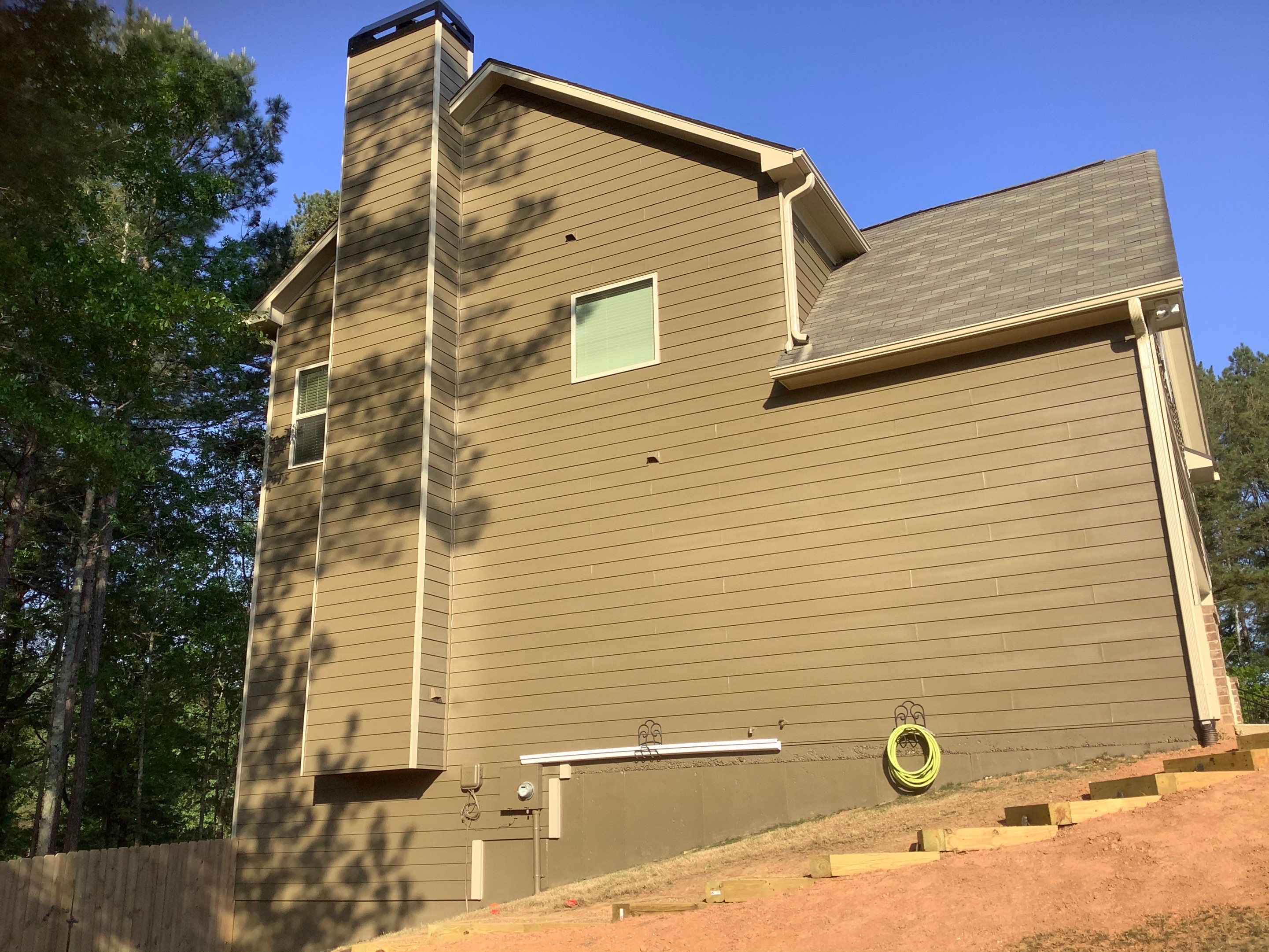 Multi-Surface Exterior Painting for Two-Story Residence in Powder Springs by Swift Home Renovations