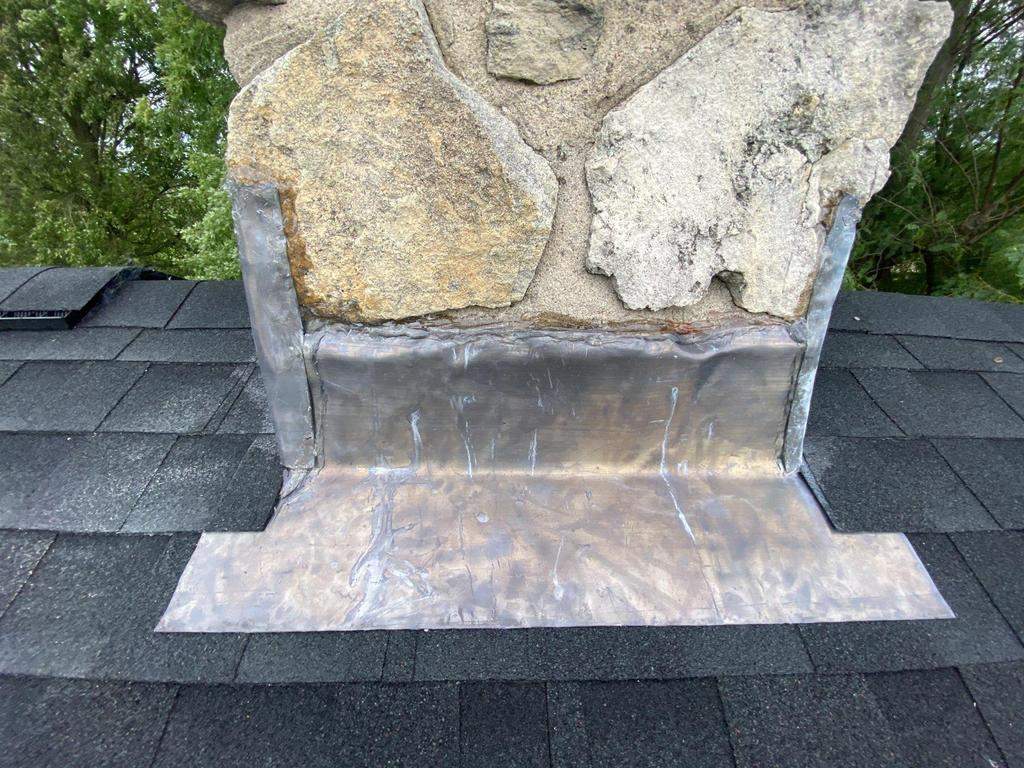 Storm damage roof replacement by Nitro Roofing and Construction