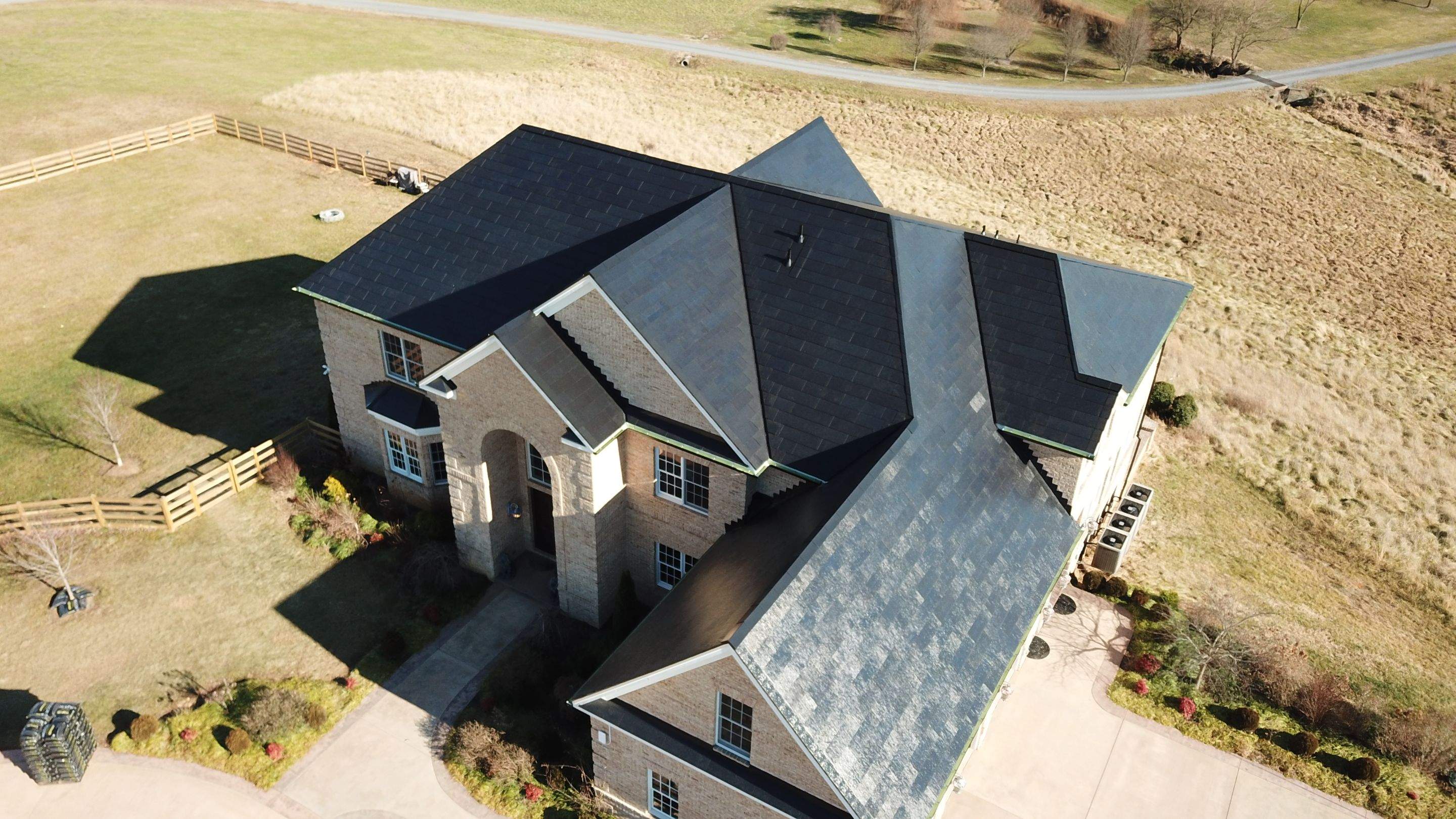 Tesla Solar Roof Replacement by American Home Contractors
