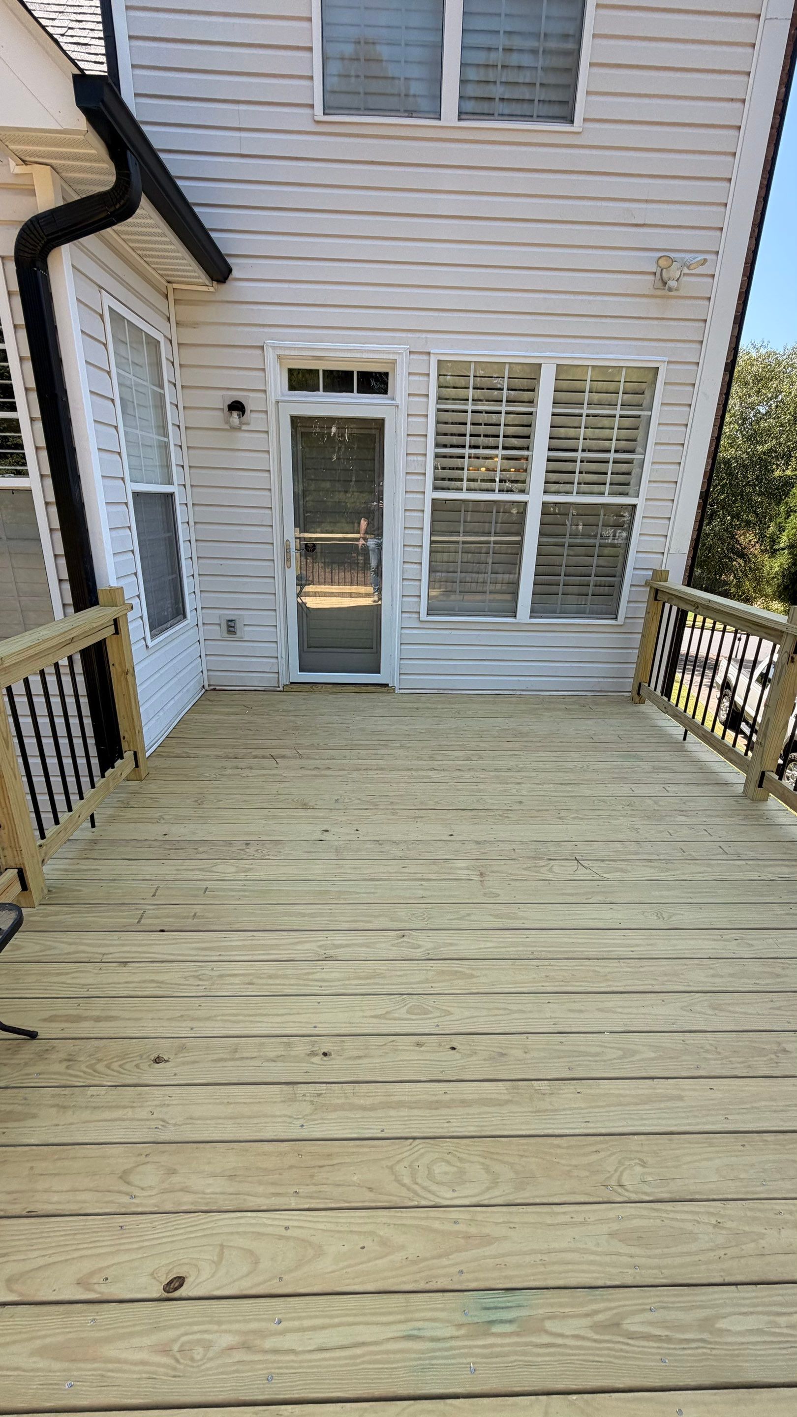 Elevated Pressure-Treated Deck and Staircase Rebuild in Douglasville by Swift Home Renovations