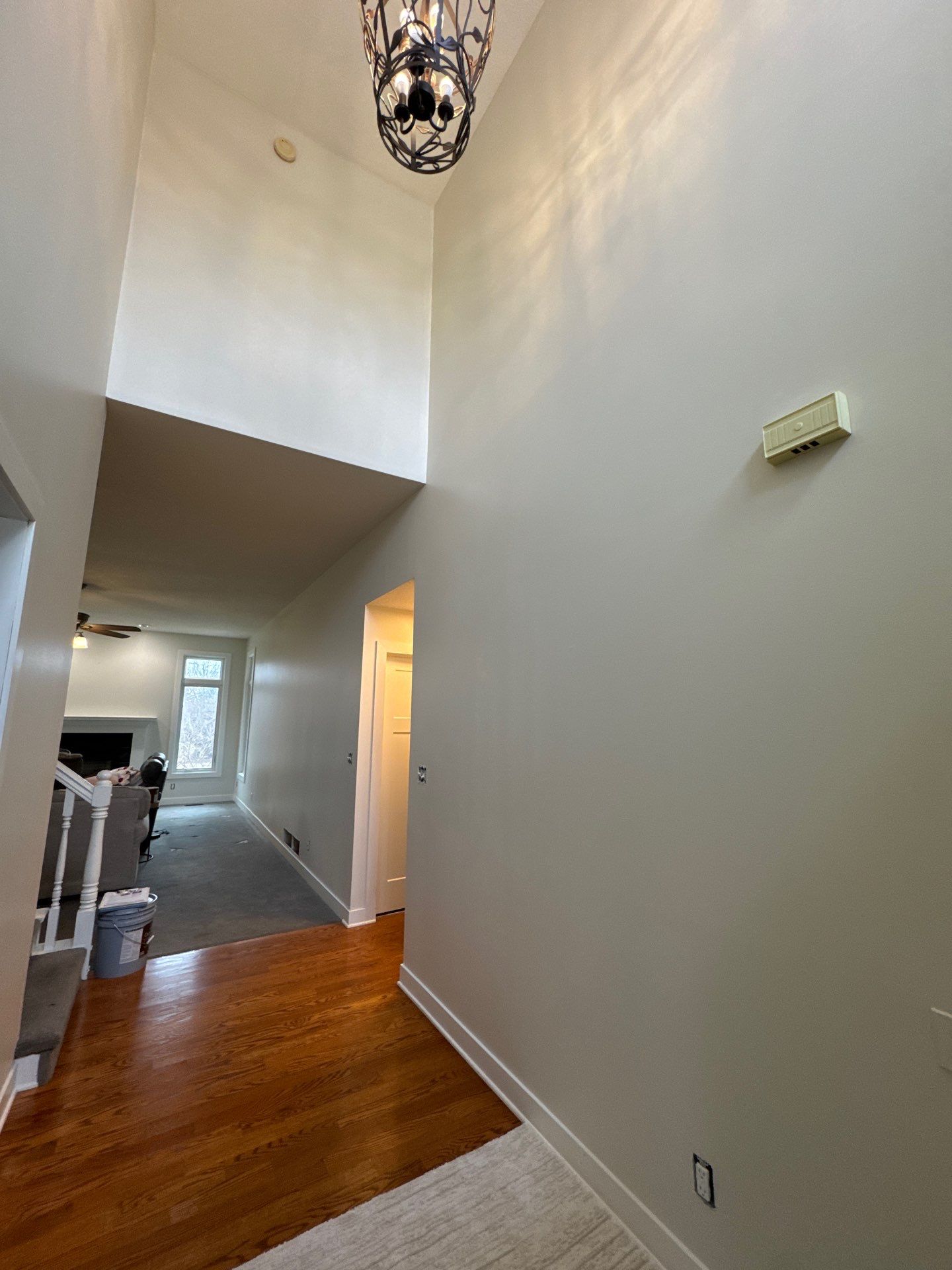Residential Interior Wall Repaint | Foyer, Stairwell, Hallway & Living Room by Midwest Paint LLC