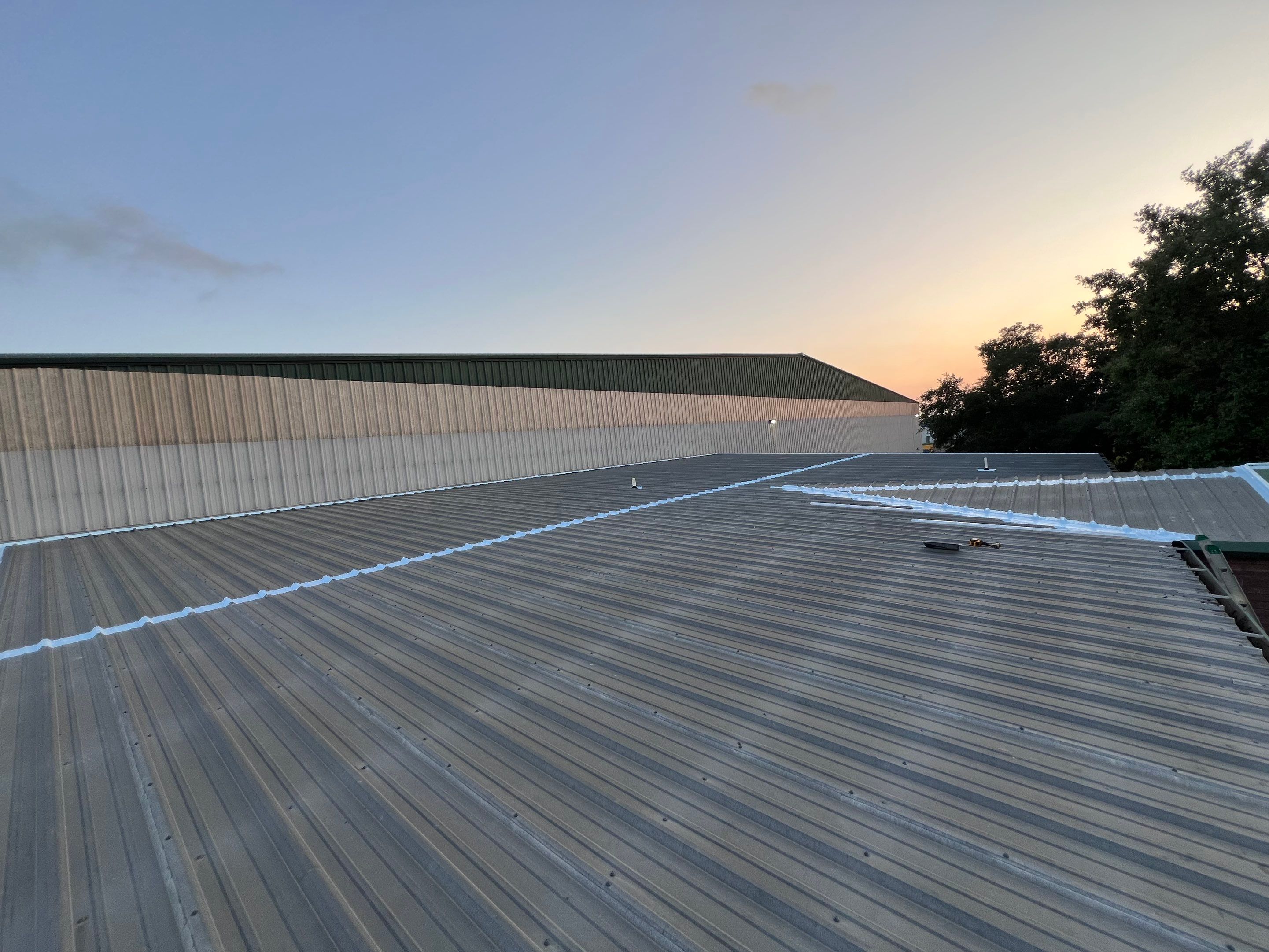 Hail Damage using Metal by Roof Repair Company