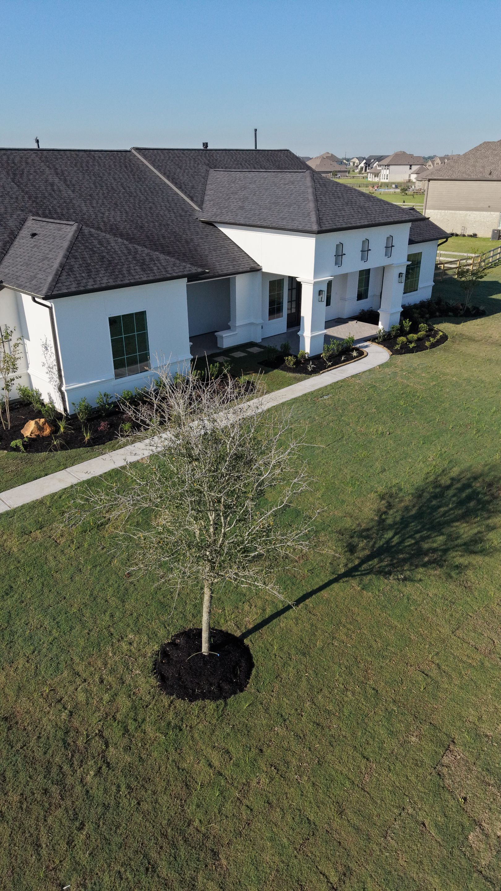 Custom Stucco Masterpiece with Precision Foam Detailing – Waller, TX by Apex Conventional Stucco Llc