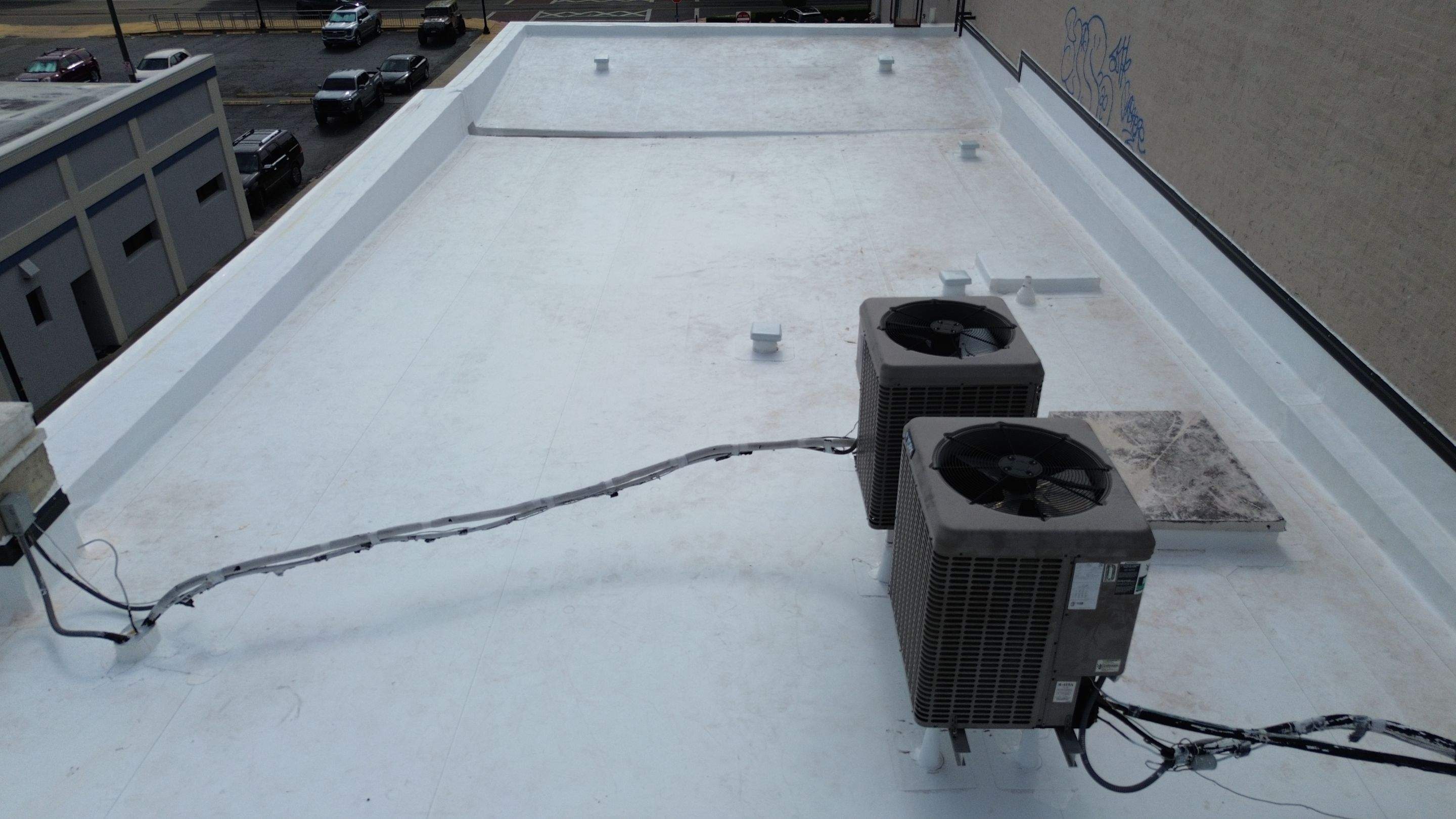 Flat Commercial TPO Reroof in Downtown Ocala, FL by Brehm Roofing