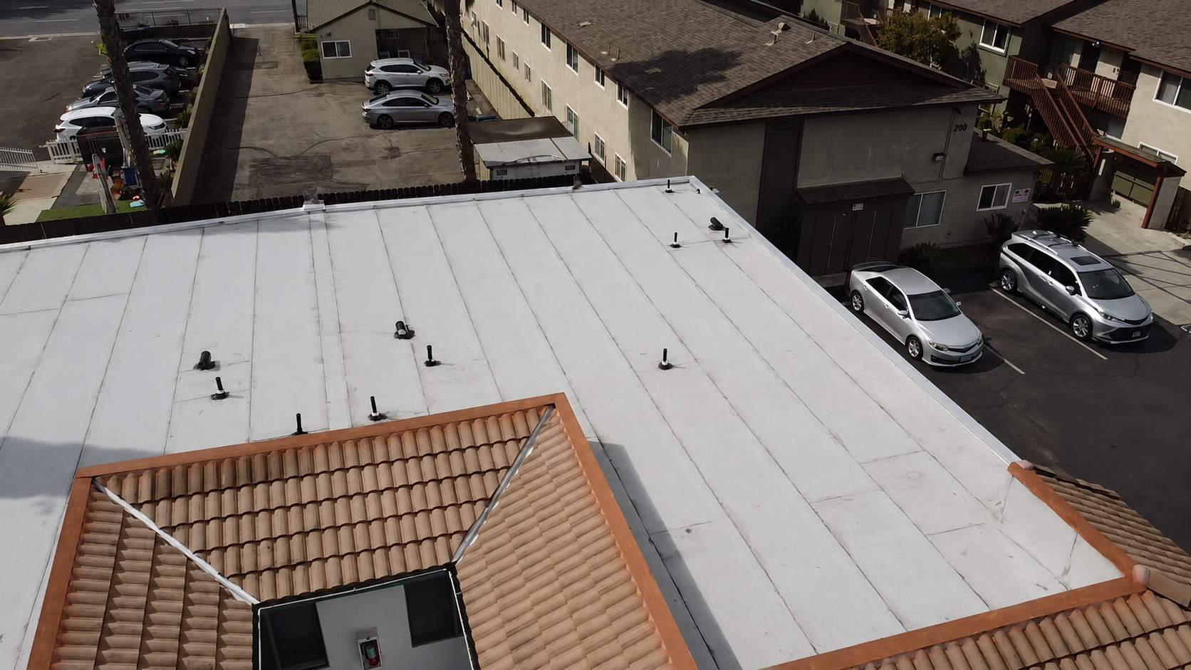 El Cajon Apartment Two-Ply Torch Down Roof Replacement by Zenith Roofing Services