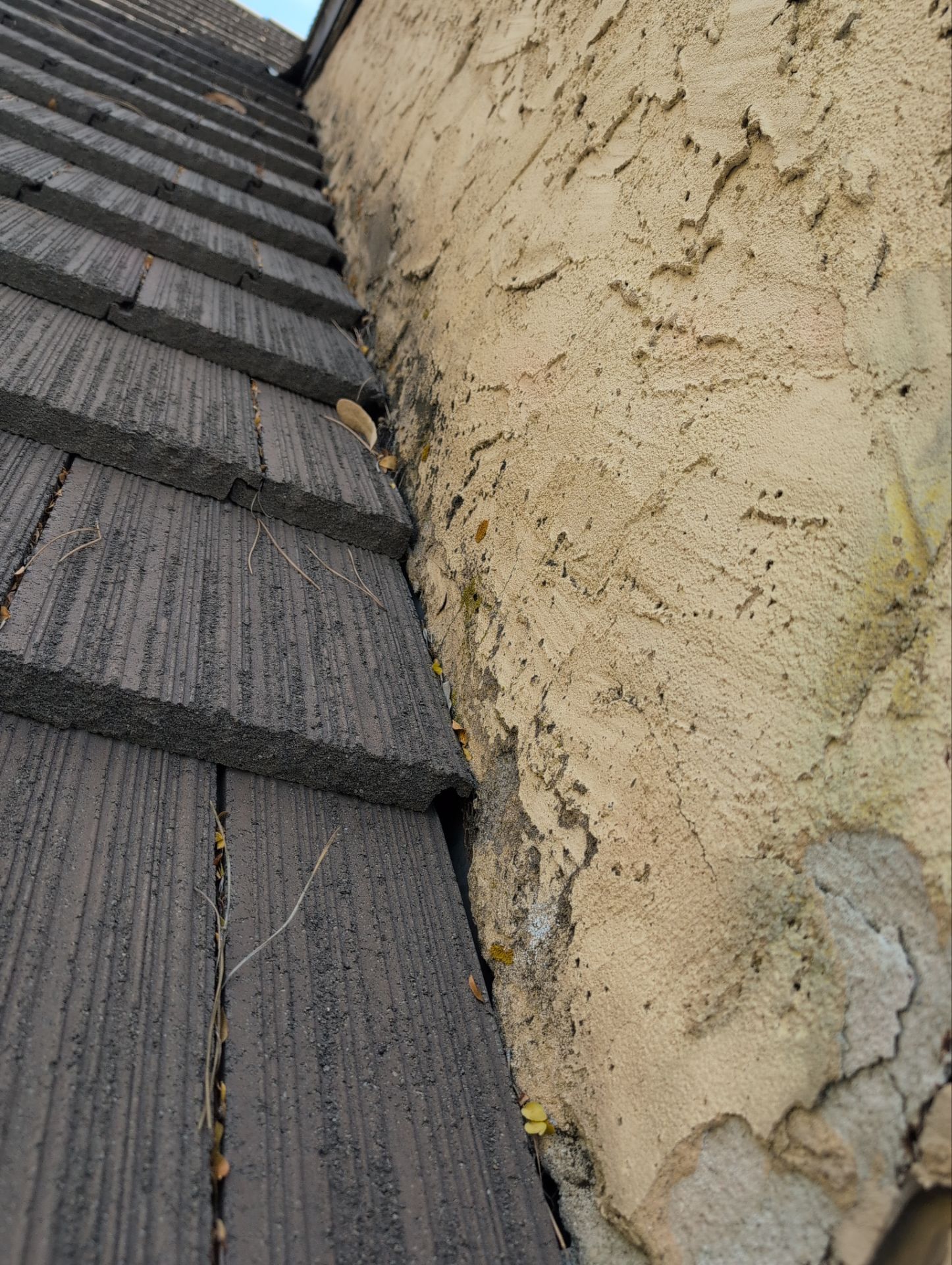 Unified Stone Coated Roof & Stucco Remodle by Blue Peaks Roofing LLC