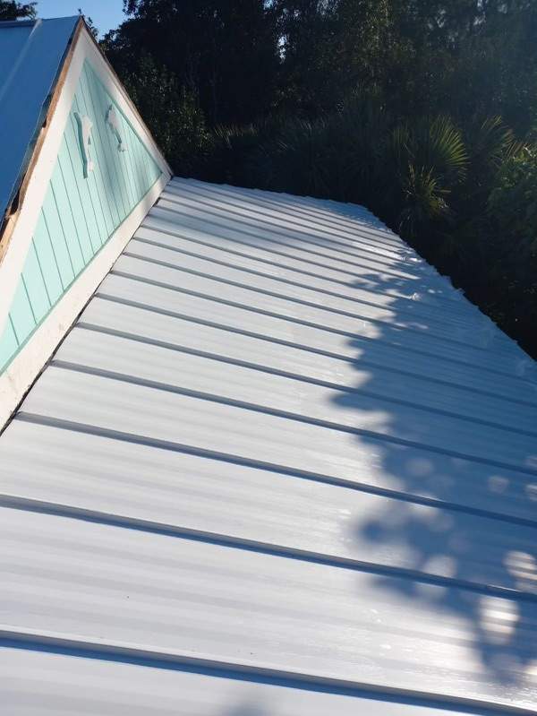 Residential Roofing Installation using Gulf Coast Metals Gulf Seam Panels by Four Peaks Roofing