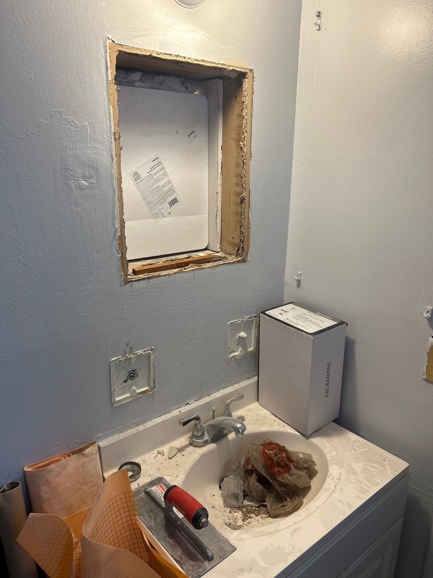 Dual Bathroom Makeover by urban green energy llc