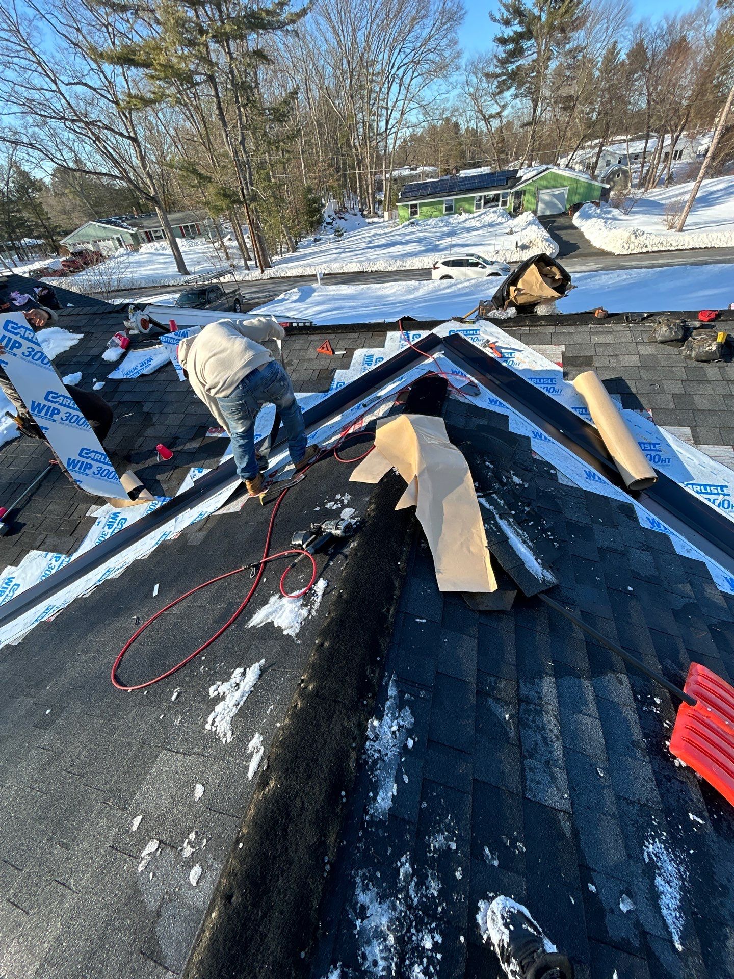 Ridge Cap Replacement & Black Metal Valley Installation in Chelmsford, MA by Mighty Dog Roofing of Greater Middlesex County