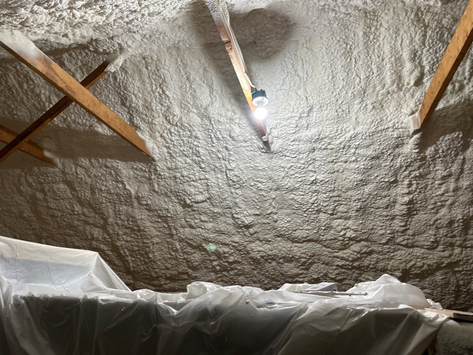 Attic Insulation using open cell spray foam by NYS Foam & Energy