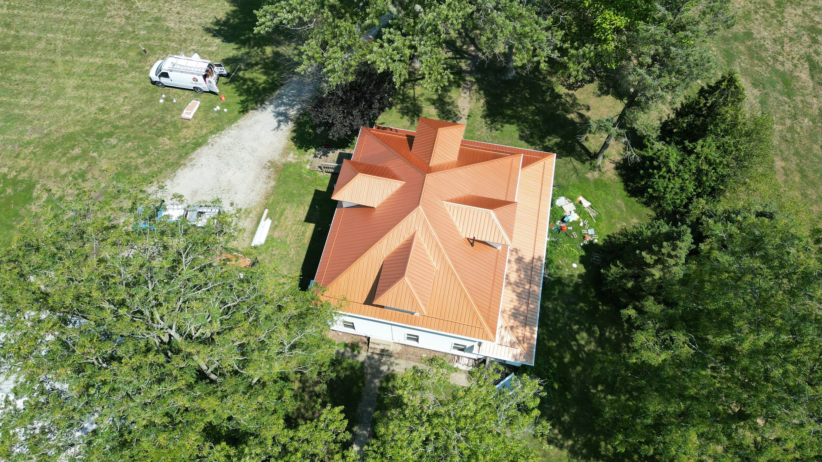 Residential Roofing Installation using Performance Panel Metal - Copper Metallic by RoofX 