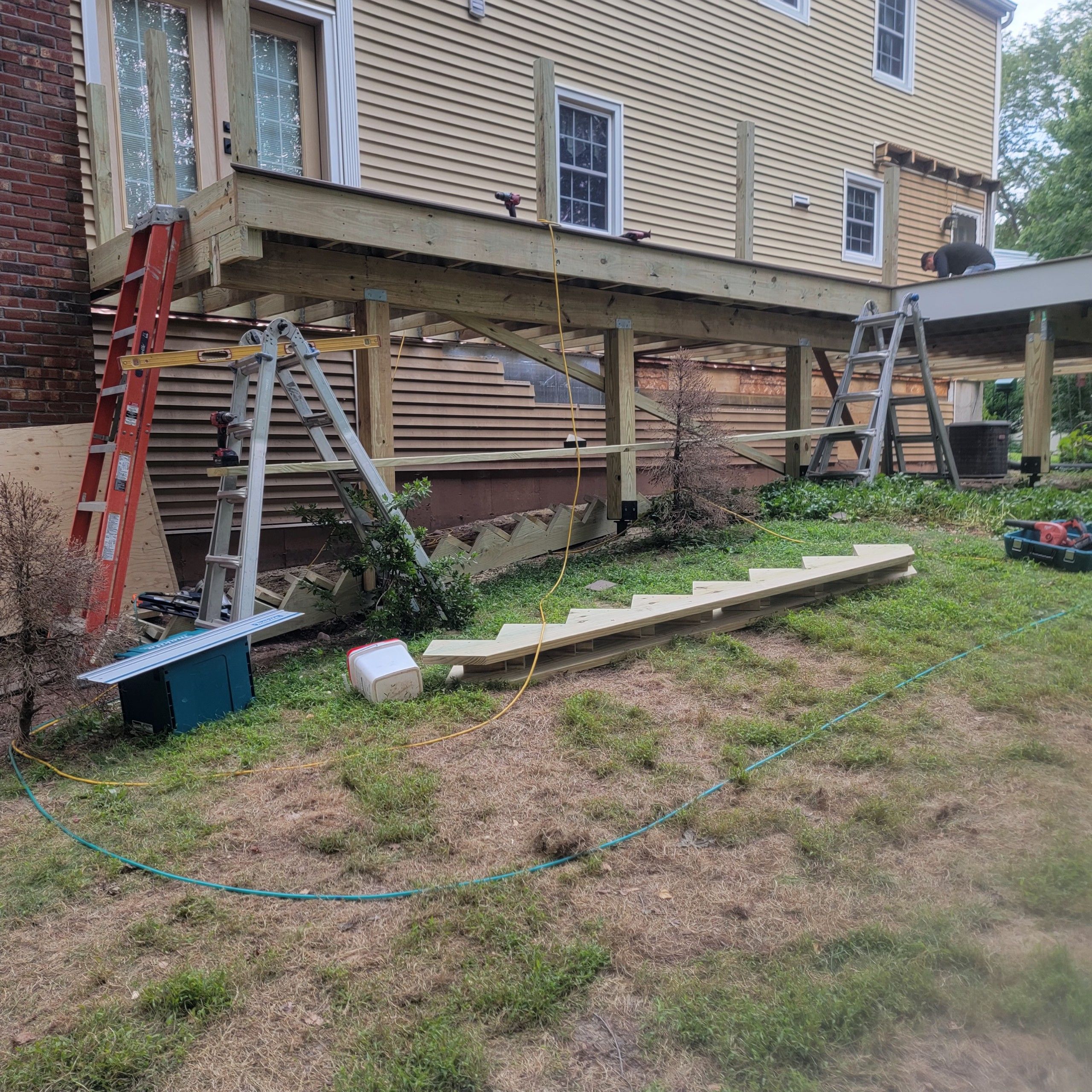 Deck and Screened in room replacement with Trex Saddle and vintage lantern railings by DiGiorgi Roofing and Siding Inc