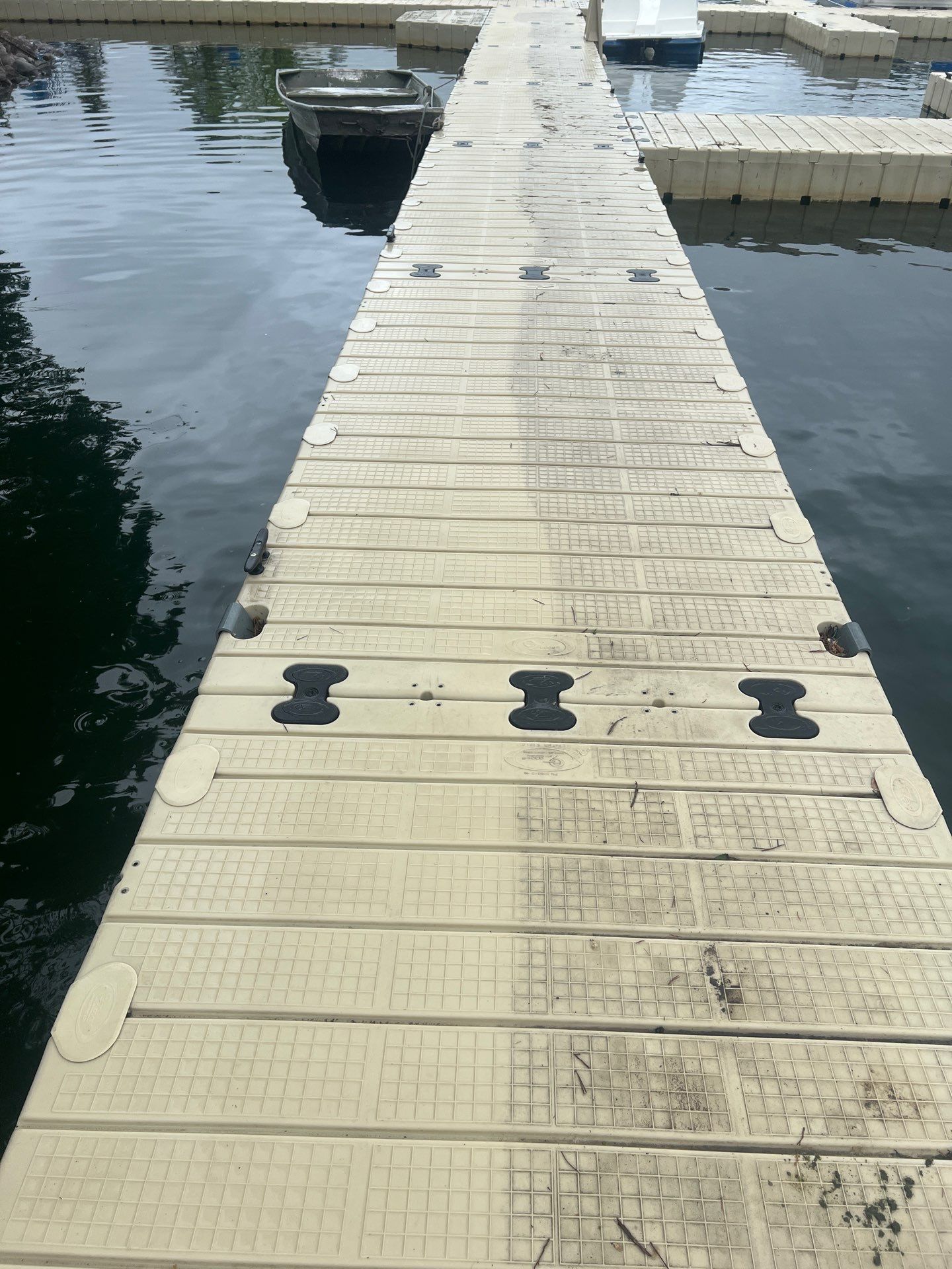 Power washing of floating dock by Northern Power Washing LLC.