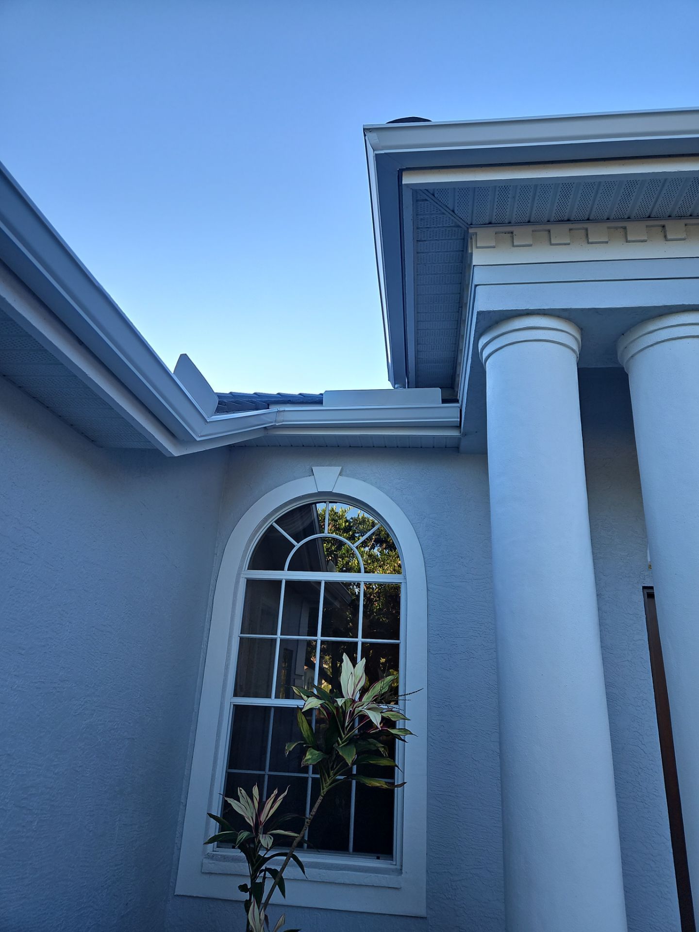 White Down Spouts using downspouts and White Seamless Gutters in Sarasota FL by Gutter Professors