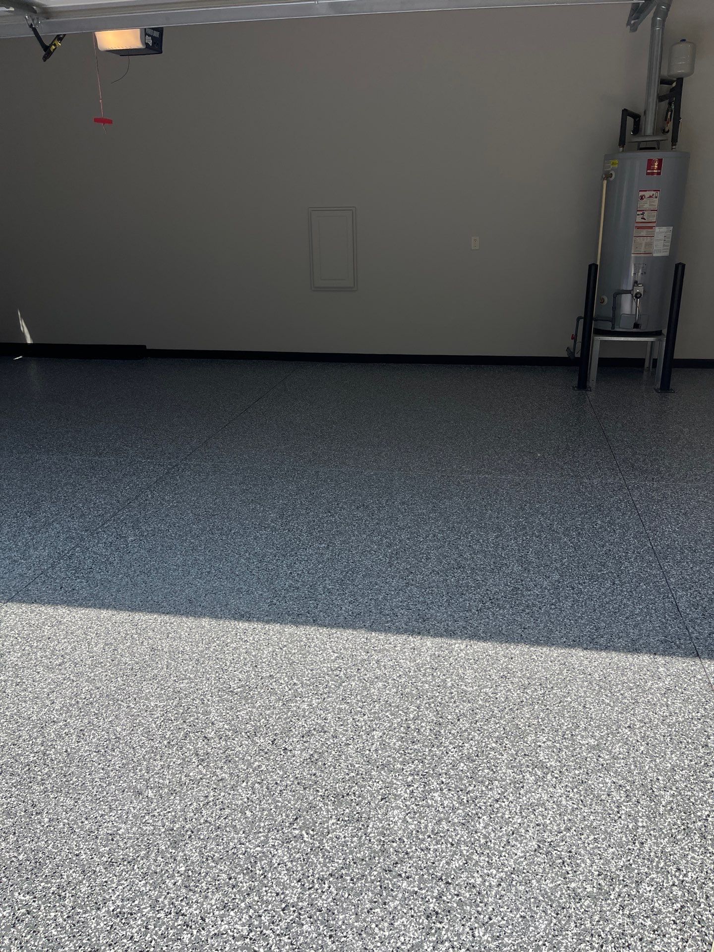 Garage Floor Coating using Wombat by My Garage Floor Guys