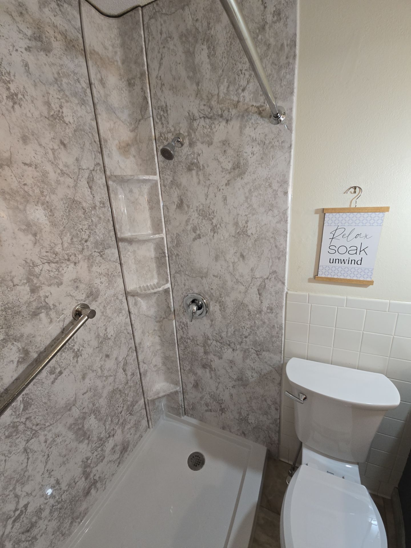 Tub to Shower , flooring, and countertop by The Shower Company