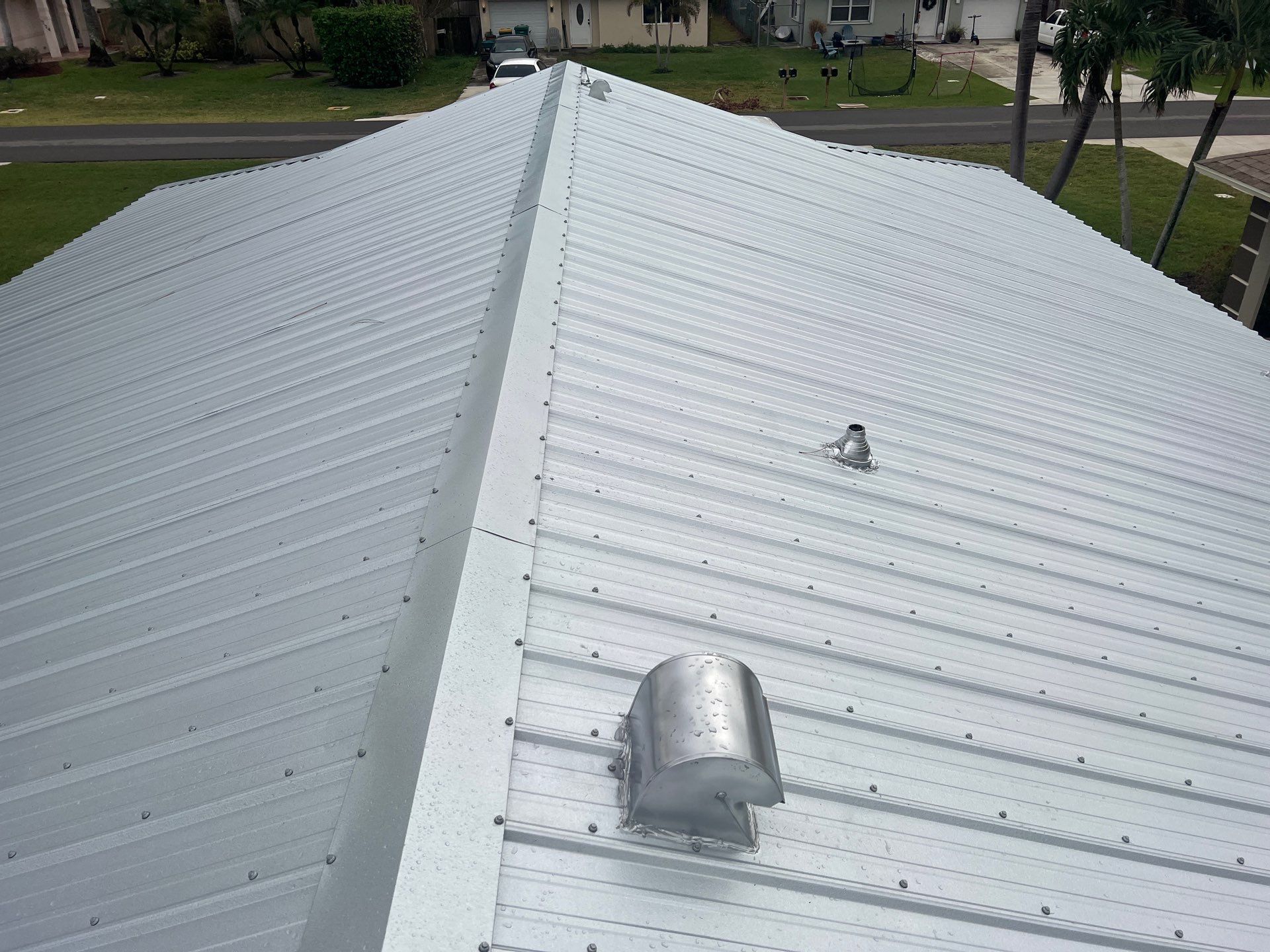 Residential Roofing Installation using Durabull Classic Rib Panel by Durabilis Roofing INC