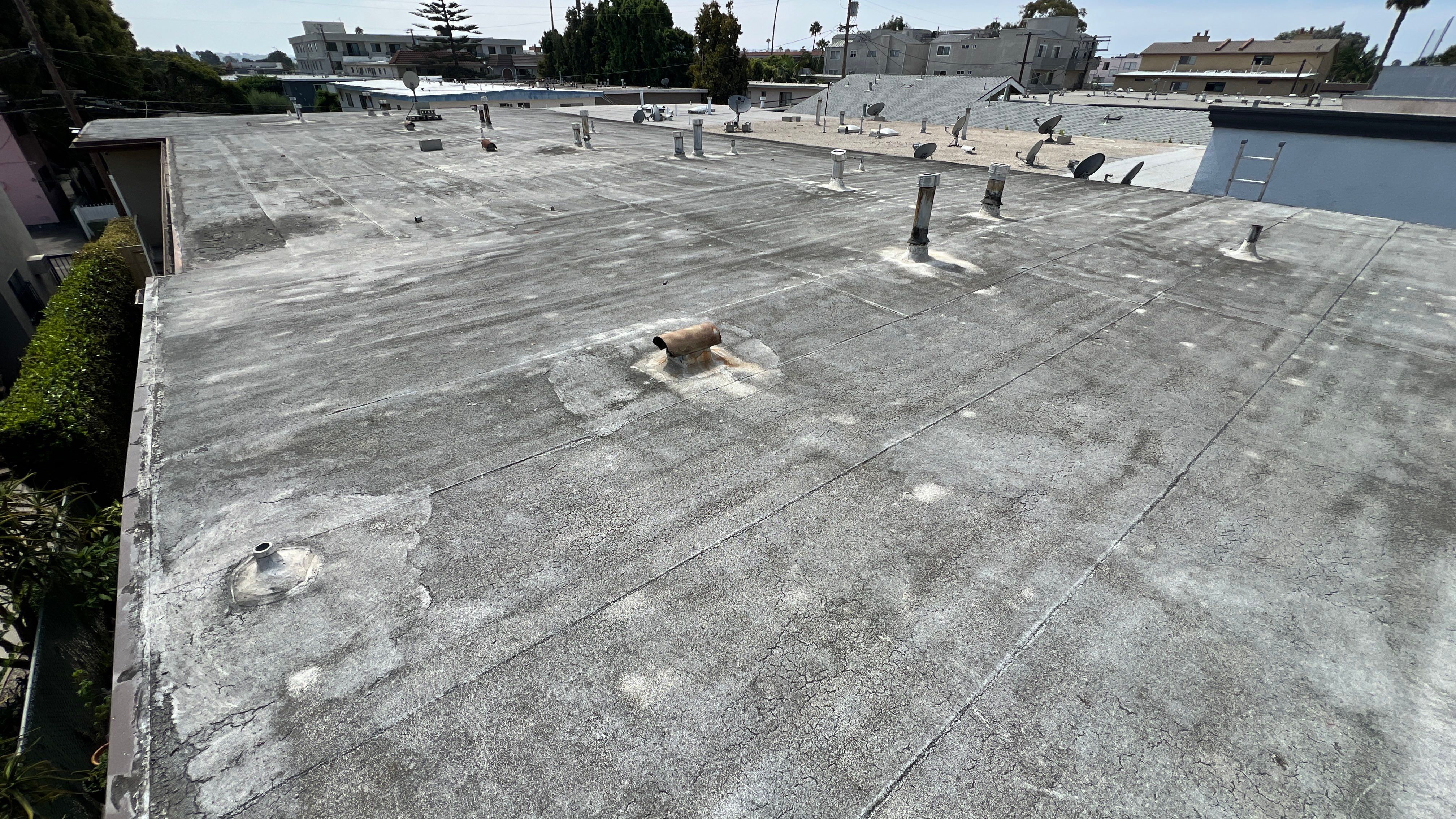 Commercial Roofing Installation using Silicone Coating by Hull Brothers Roofing