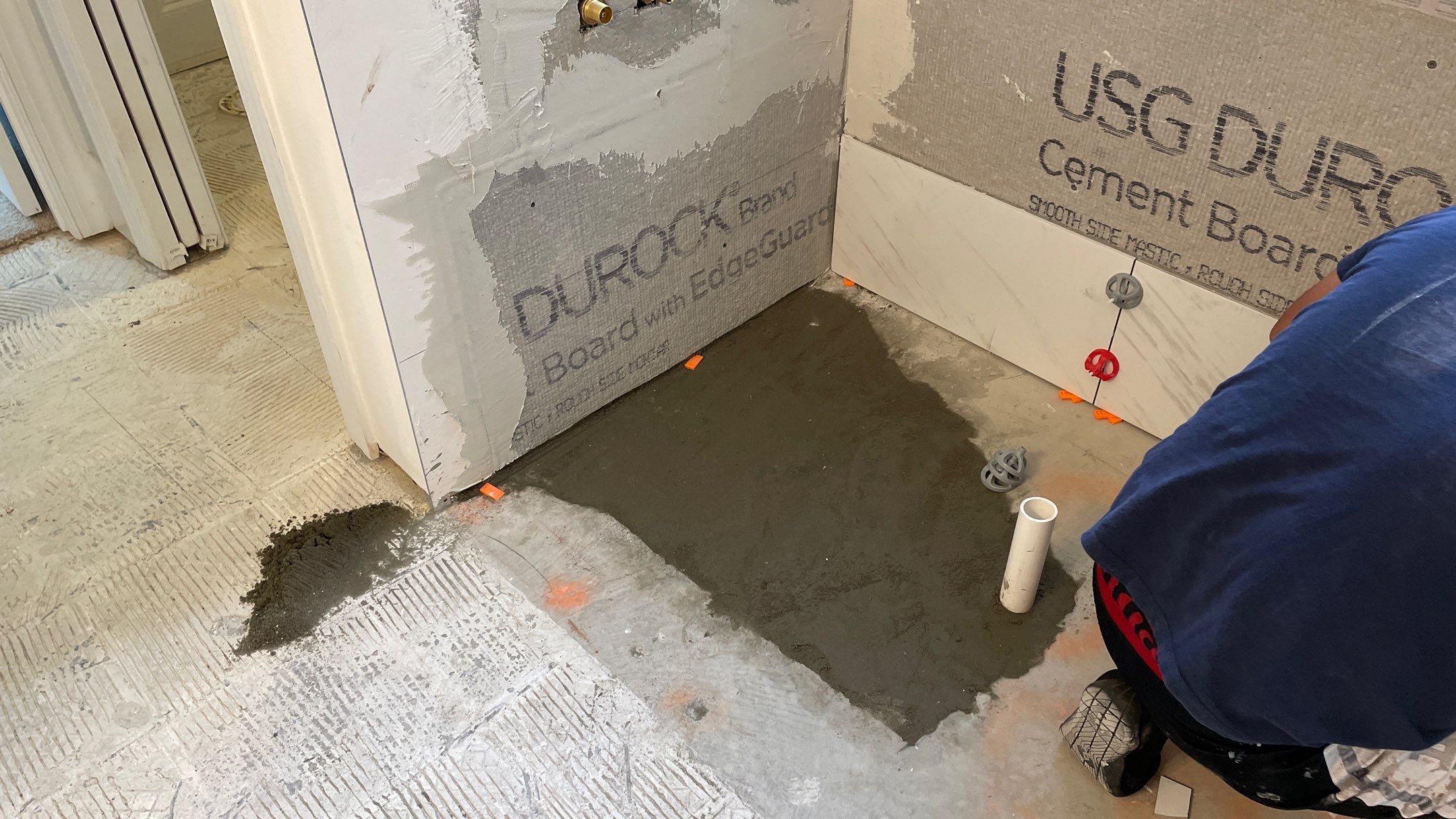 Bright Bathroom Remodel with Wall Removal, Stand Alone Tub and New Vanity by Footprints Floors of Coastal Carolina