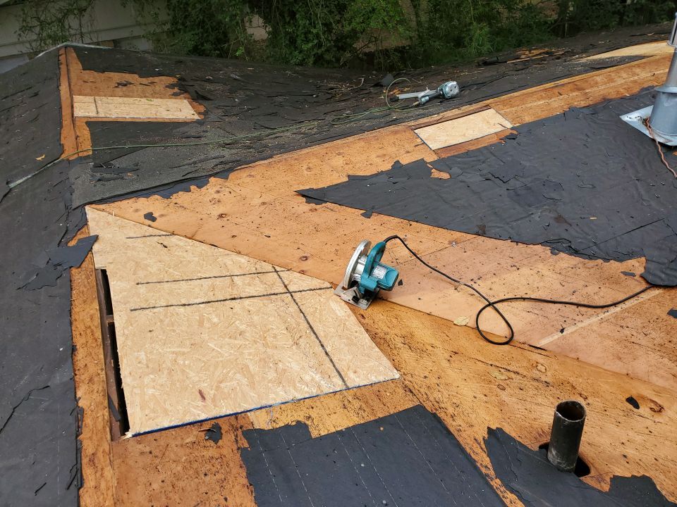 Residential Roofing Installation using Roof Replacement by American Roofing & Construction LLC