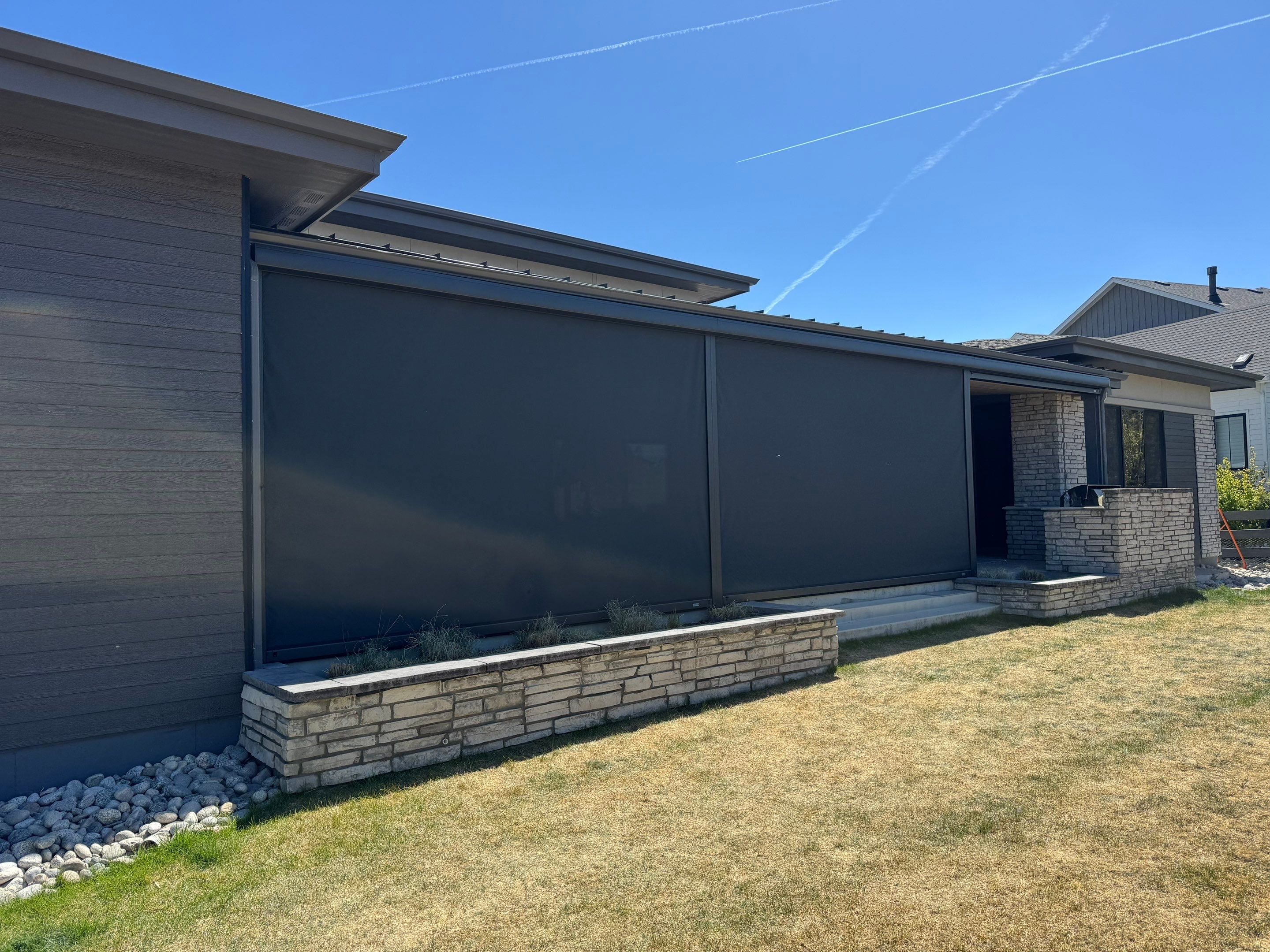 Exterior All-Weather MagnaTrack Screens Installation using Progressive MagnaTrack Screens by Outdoor Solutions Colorado