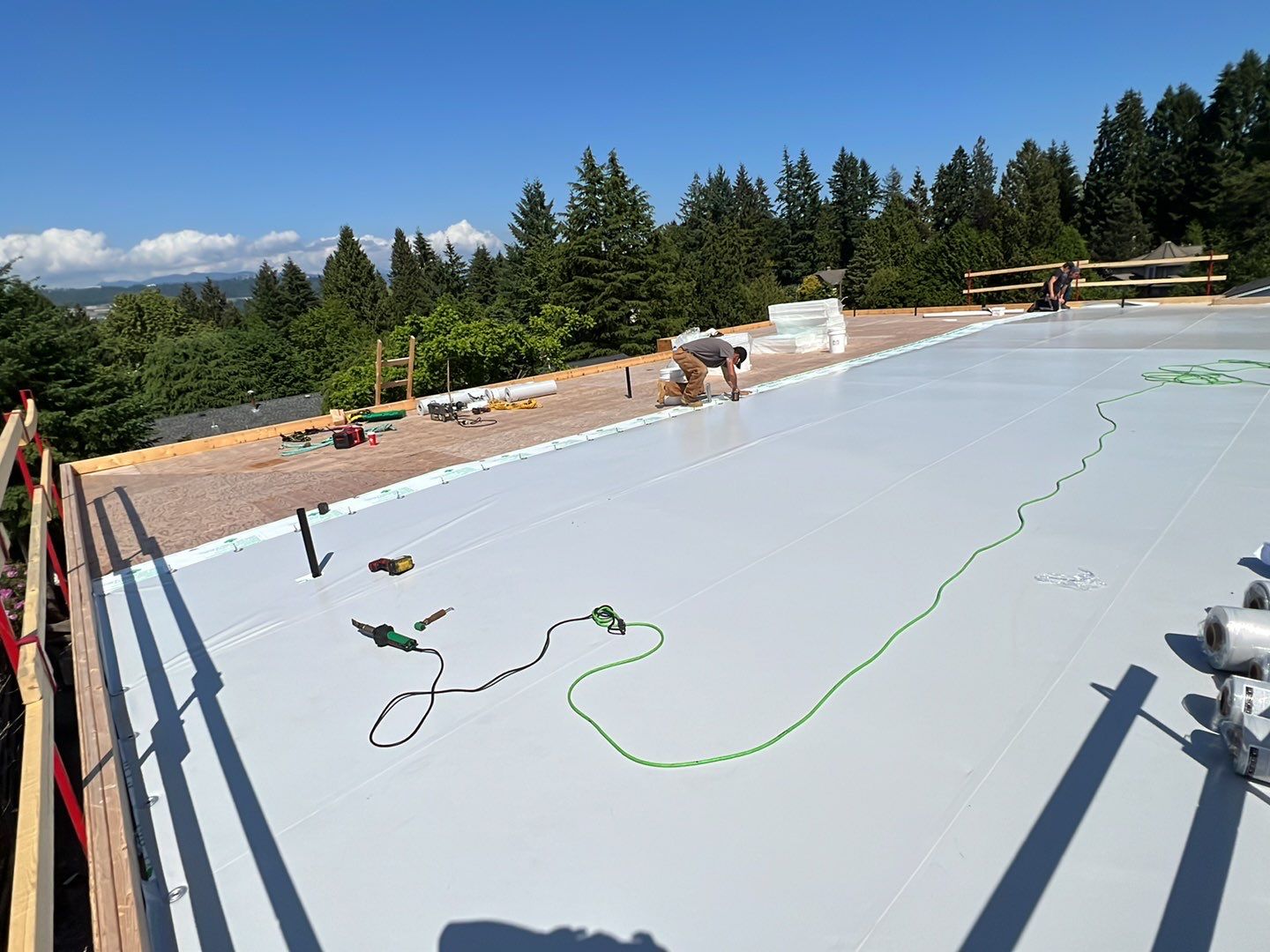 Residential Roofing Installation using Durolast roofing membrane by Top Notch Roofing Inc