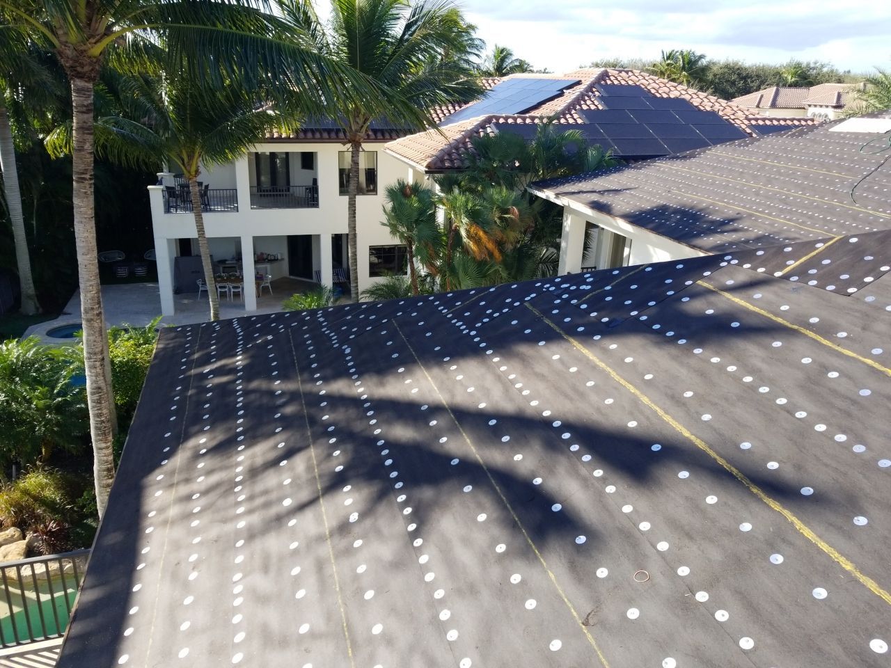 Concrete Tile Roof Replacement and Decking Repair in Boca Raton by Aastro Roofing