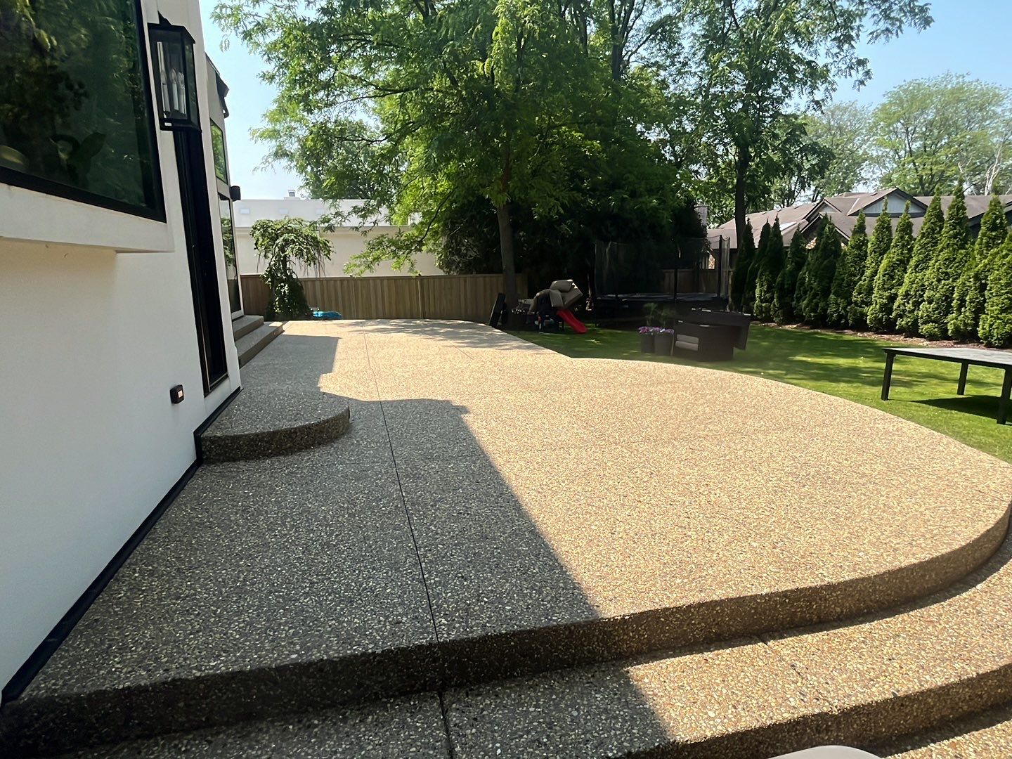 Aggregate concrete cleaning and sealing using Surebond SB-9000 by Northern Power Washing LLC.