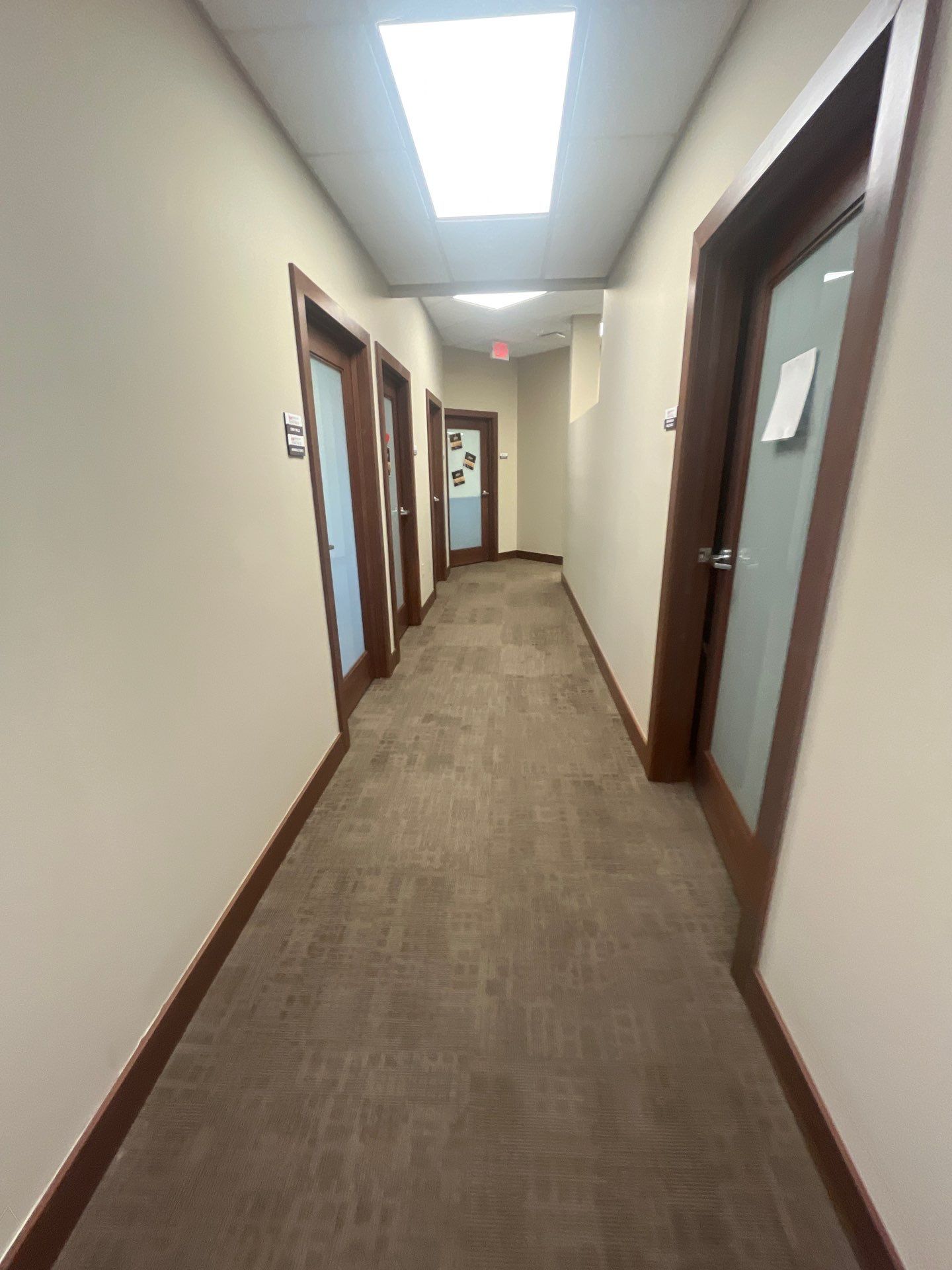 Commercial Office Interior Remodel and Modern Suite Refresh in Sioux Falls by Select Painting, Coatings & Garage Cabinets