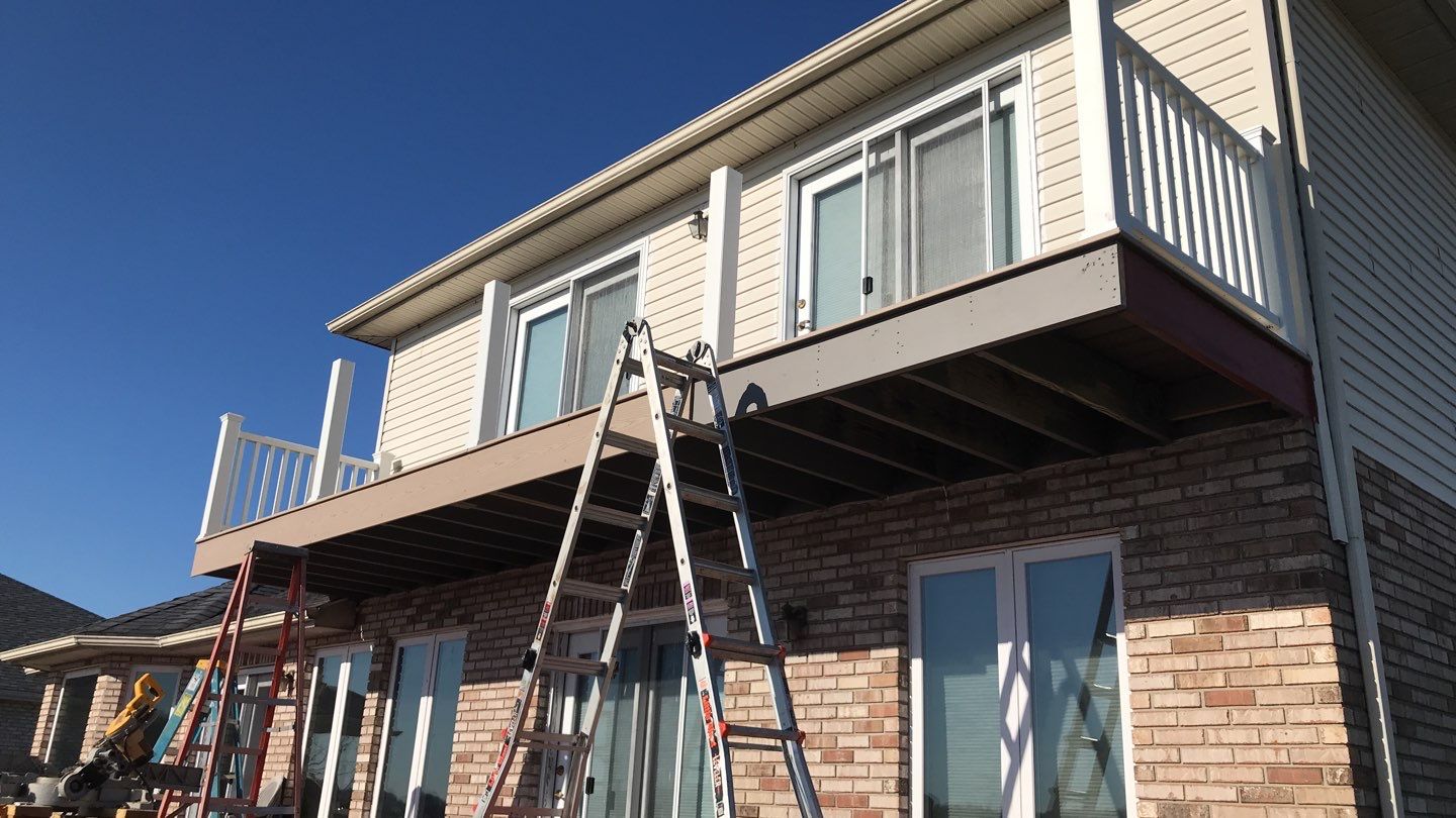 Deck Refurbush and Door Replacement using Trex Decking and Railing. Polaris Patio Doors by Secure Construction Company Inc