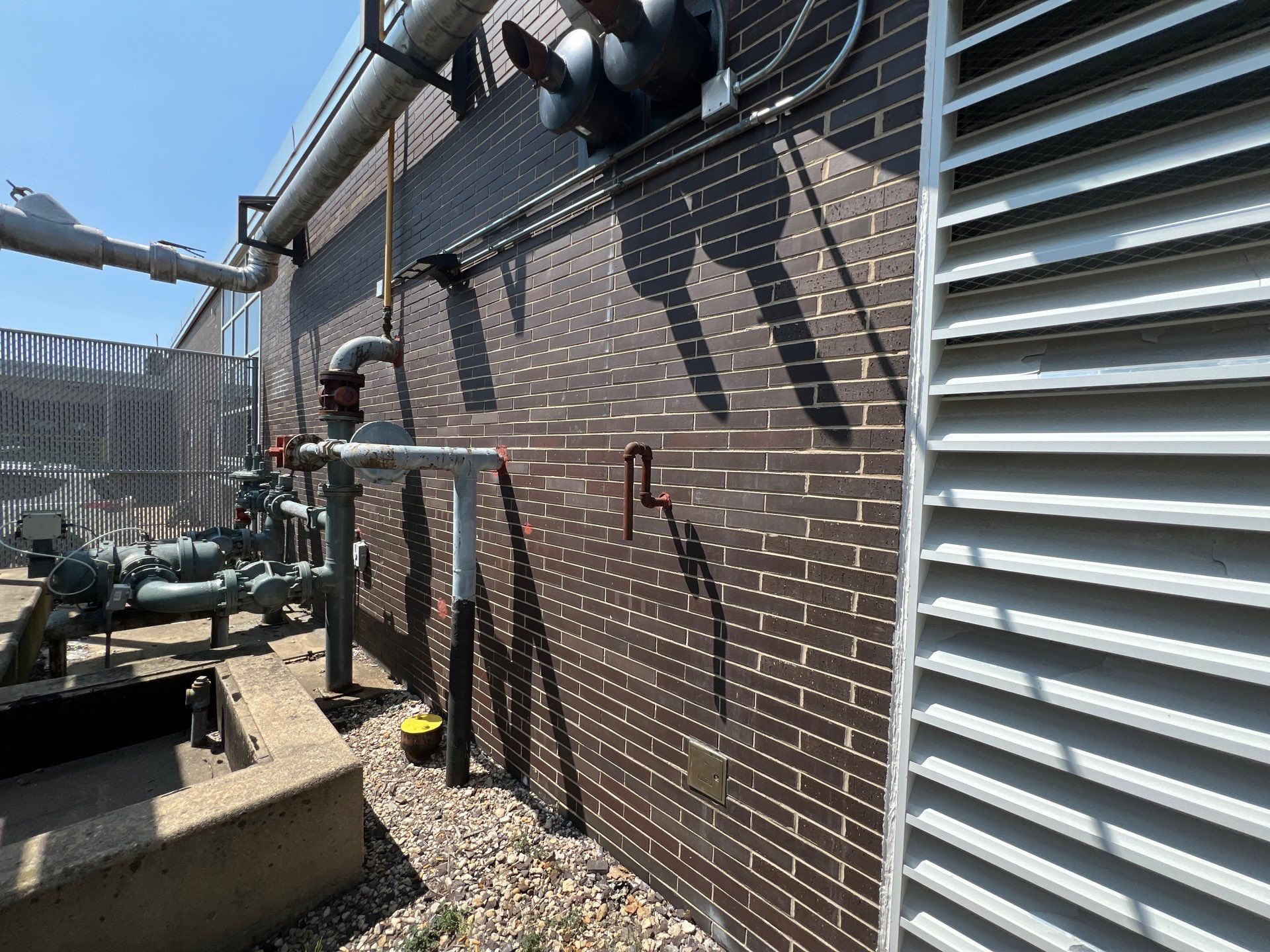 commercial pressure washing using Algaecide, soft wash soap by Northern Power Washing LLC.