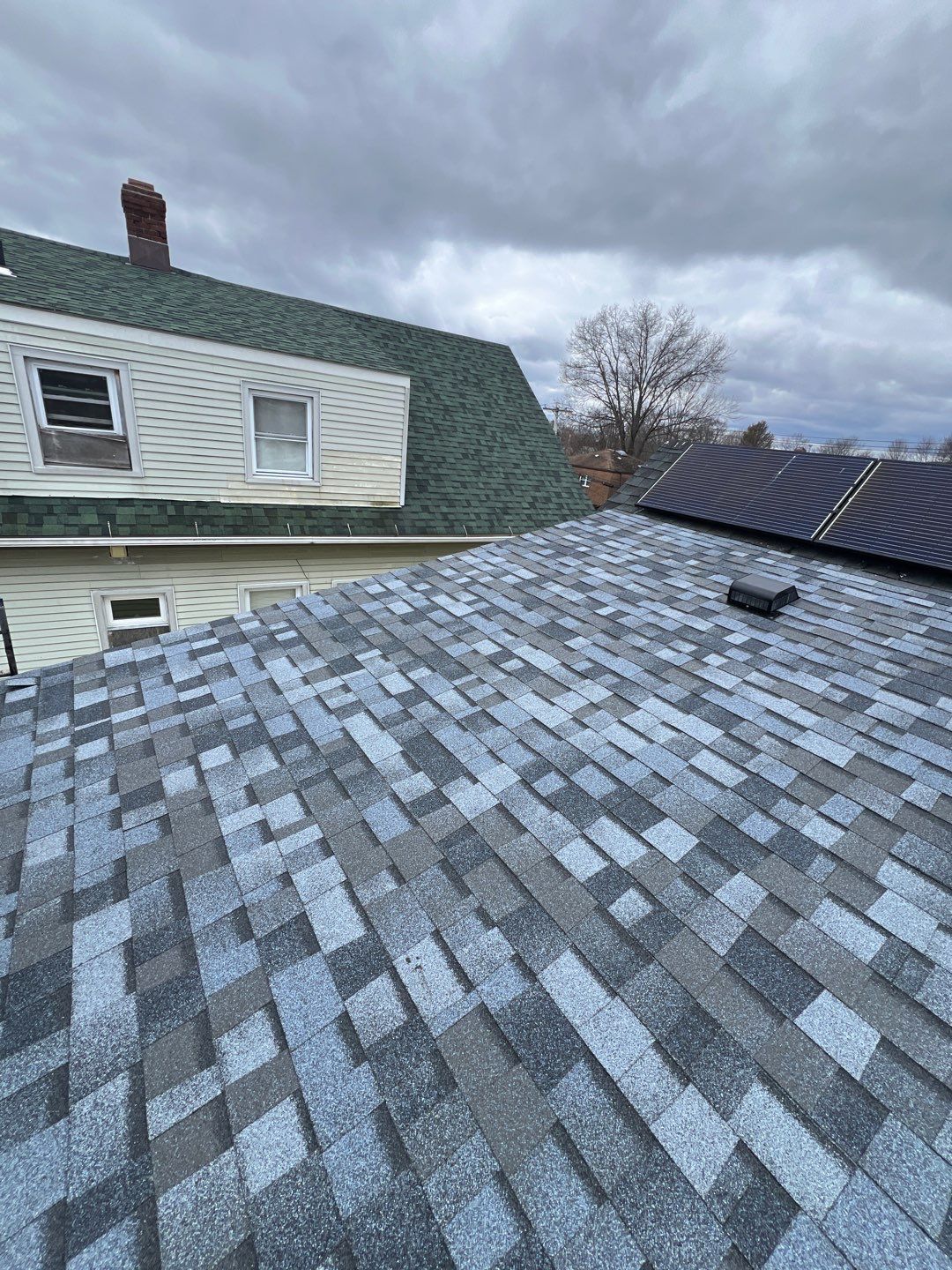 Atlantic Blue Shingles by Reimagine Roofing