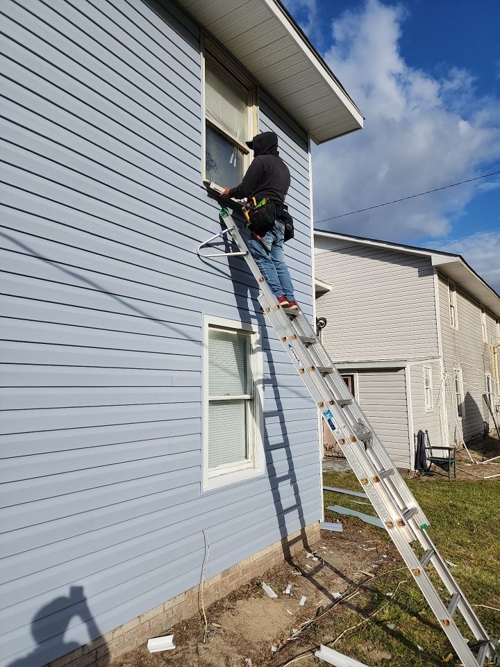 Interior and exterior renovation using Royal Building Products  by Indigo State Roofing