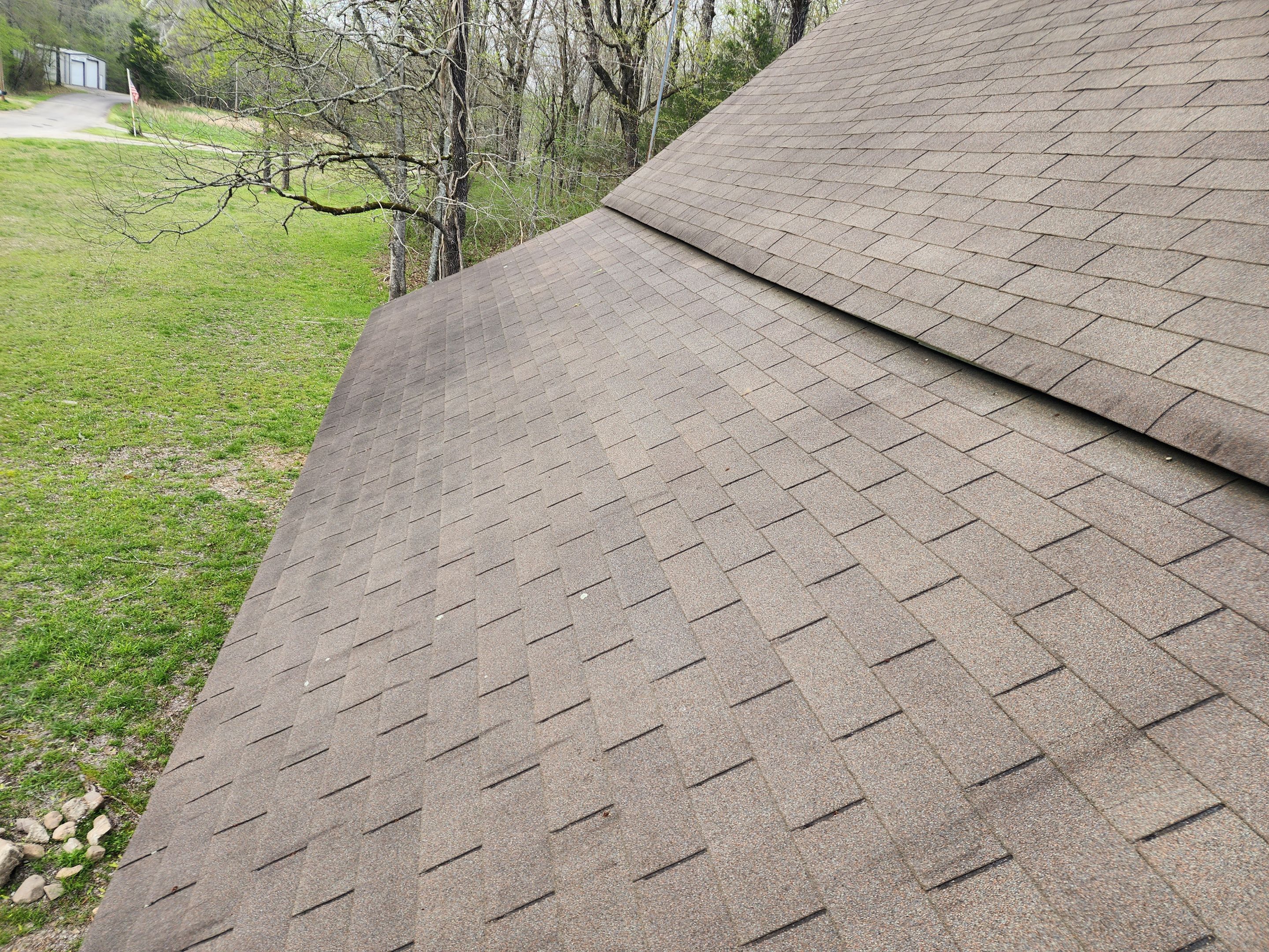 Residential Roofing Installation using 26 Gauge Colored Panels by Hostetler Roofing